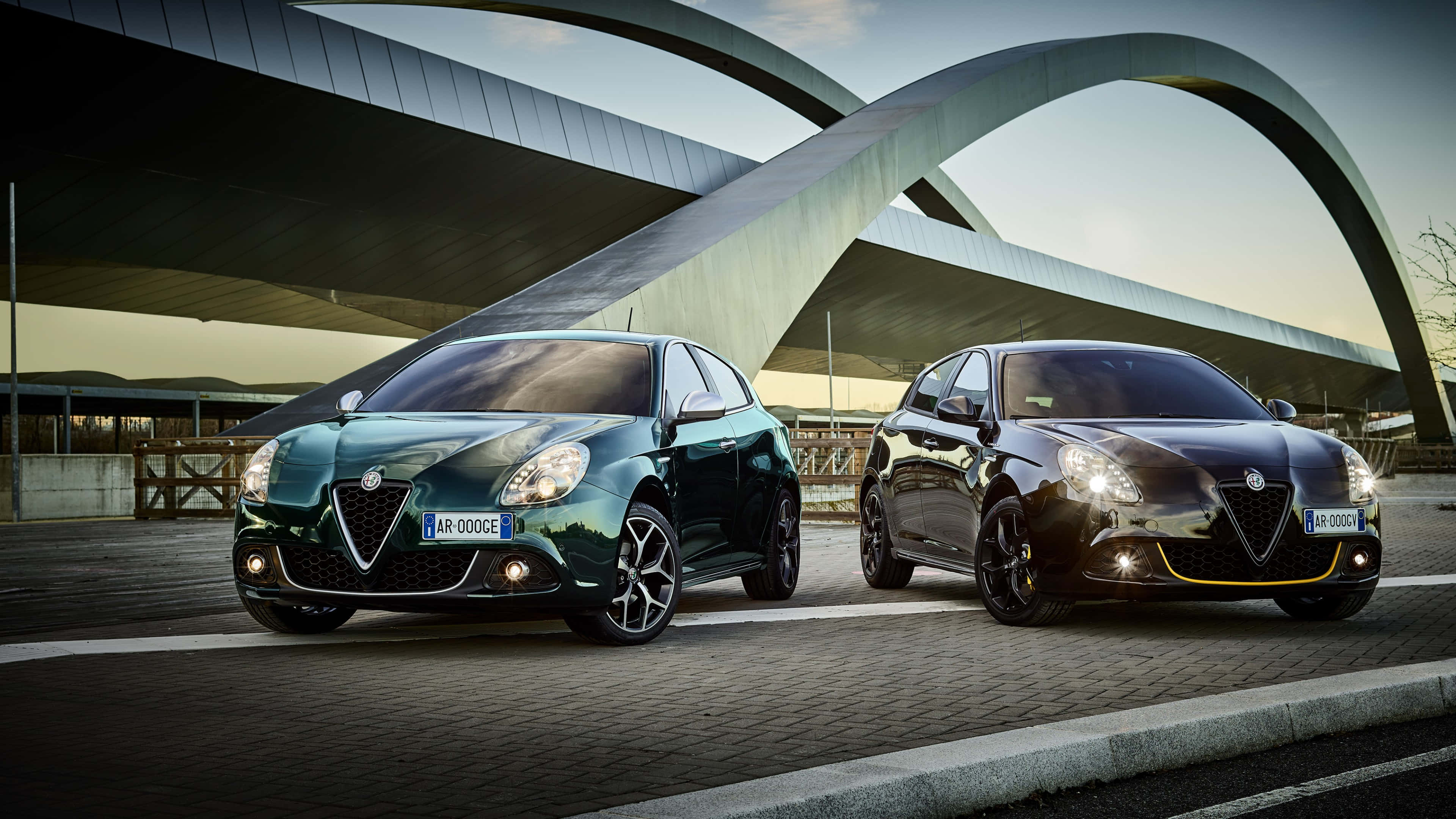 Alfa Romeo Giulietta, golden hour light, futuristic curved metal structure, 4K Desktop Wallpaper
