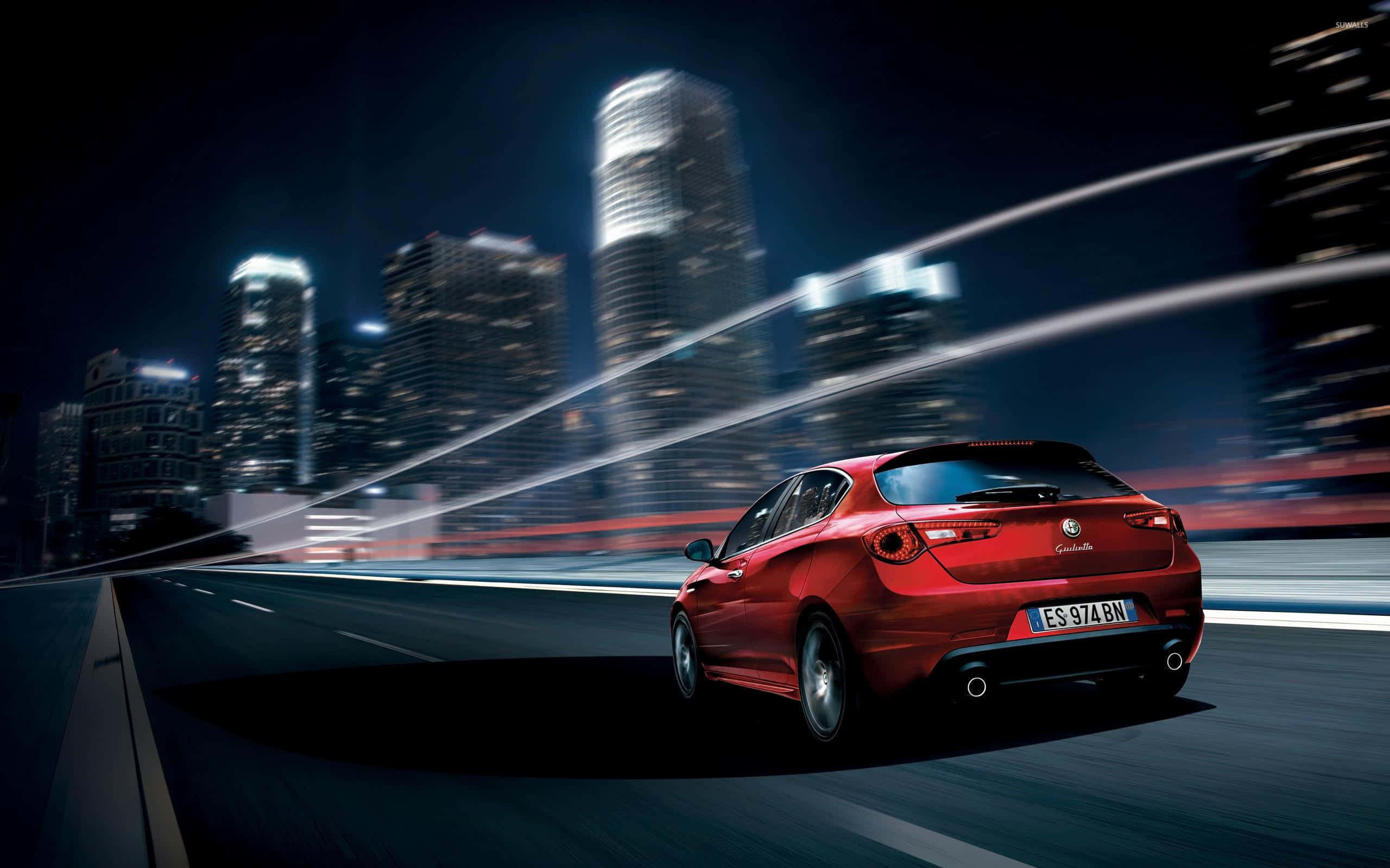 Alfa Romeo Giulietta, red sports car, neon-lit city, 2K Desktop Wallpaper