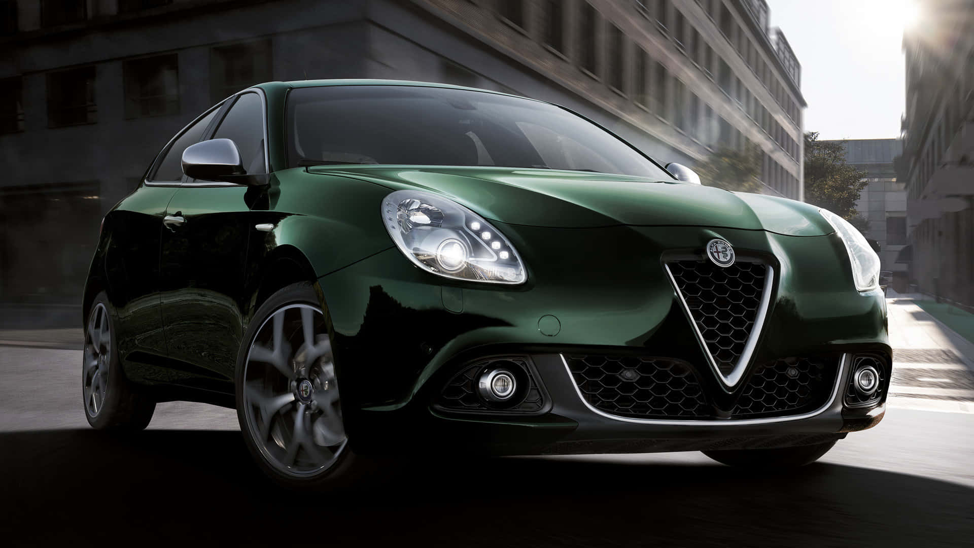 Alfa Romeo Giulietta, dark green, sunlit urban street, Full HD Desktop Wallpaper