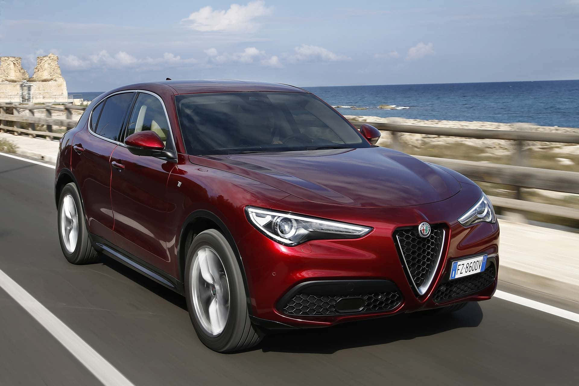 Alfa Romeo Stelvio, glossy red, coastal road, Full HD Desktop Wallpaper