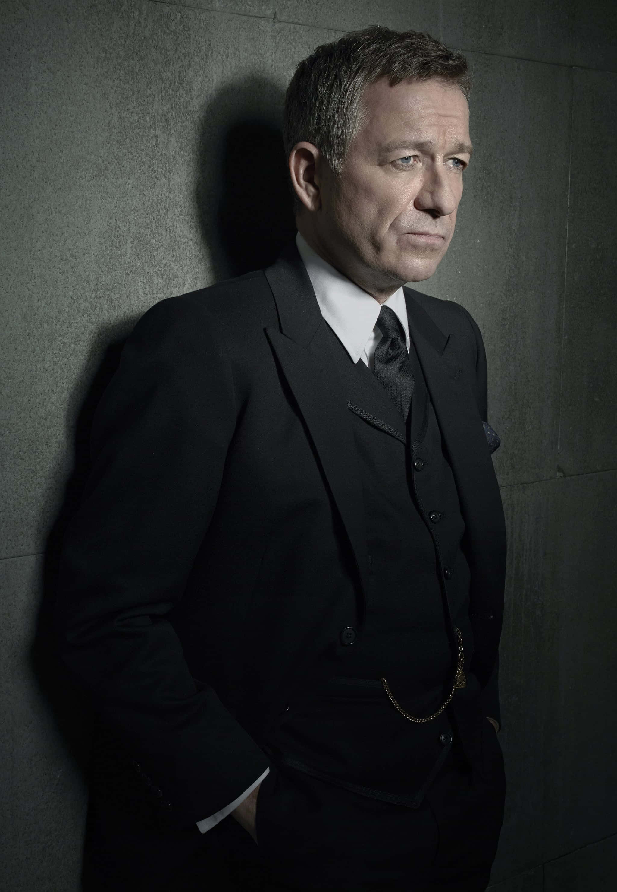 Alfred Pennyworth, black suit, gray wall, 2K Phone Wallpaper