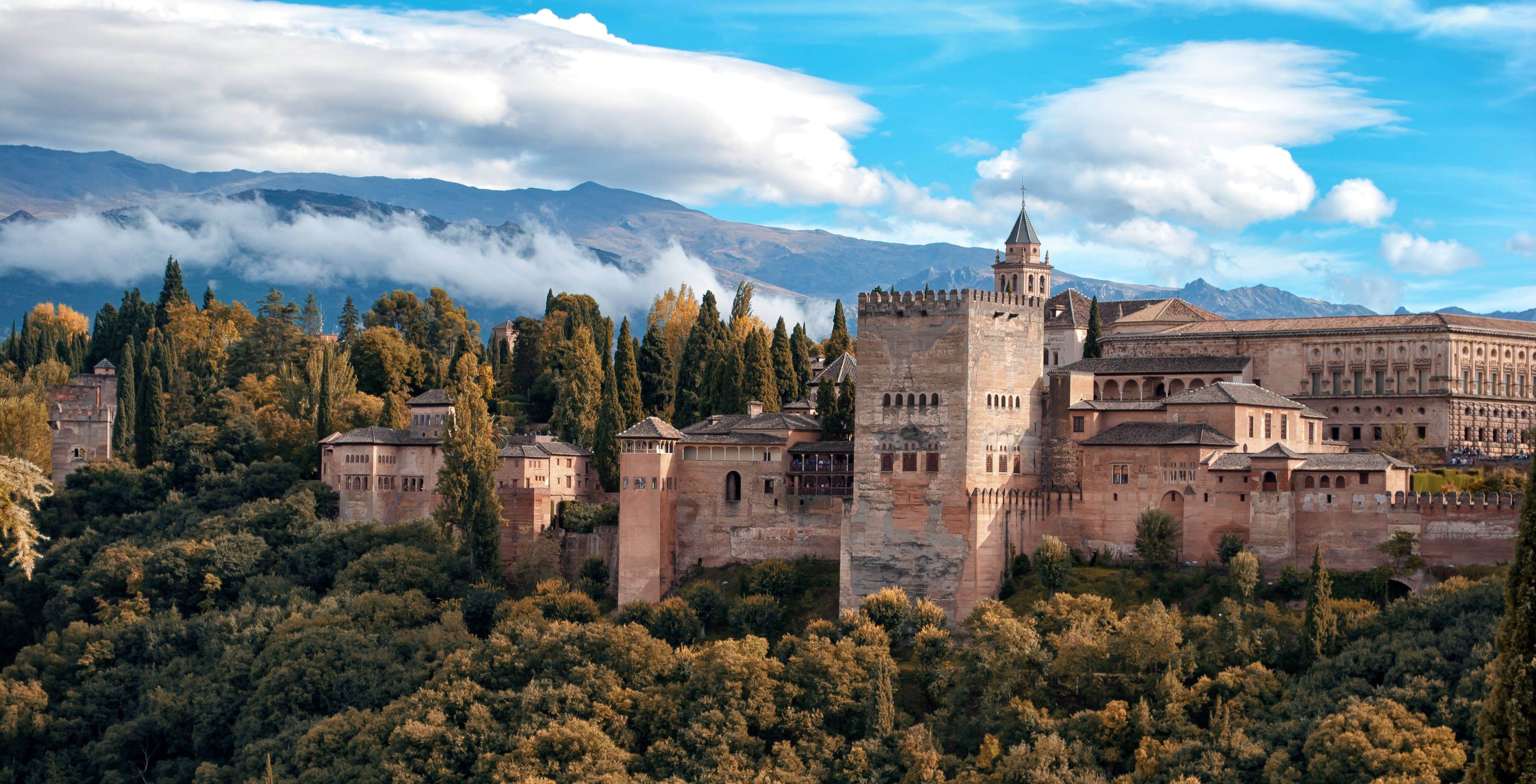 Alhambra, lush green hills, misty mountains, 4K Desktop Wallpaper