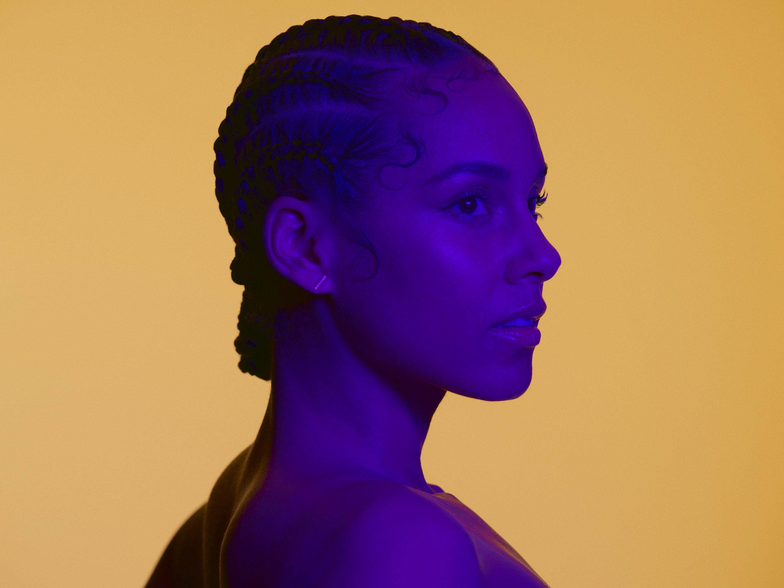 Alicia Keys, vibrant purple light, warm yellow background, 2K Desktop Wallpaper
