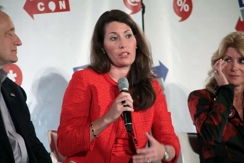 Alison Lundergan Grimes, red textured blazer, microphone, SD Desktop Wallpaper