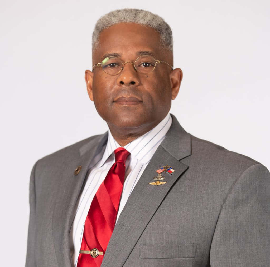 Allen West, gray suit, red tie, SD Desktop Wallpaper