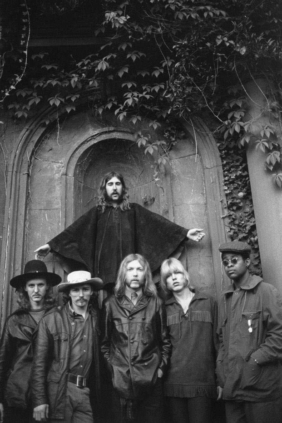 Allman Brothers Band, 1970s attire, ivy-covered stone archway, HD Phone Wallpaper