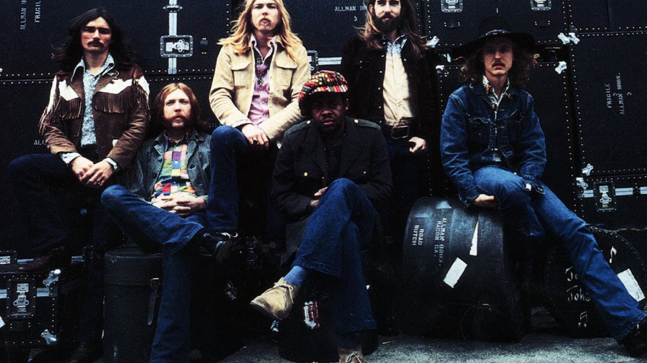 Allman Brothers Band, 1970s rock attire, equipment cases, 2K Desktop Wallpaper