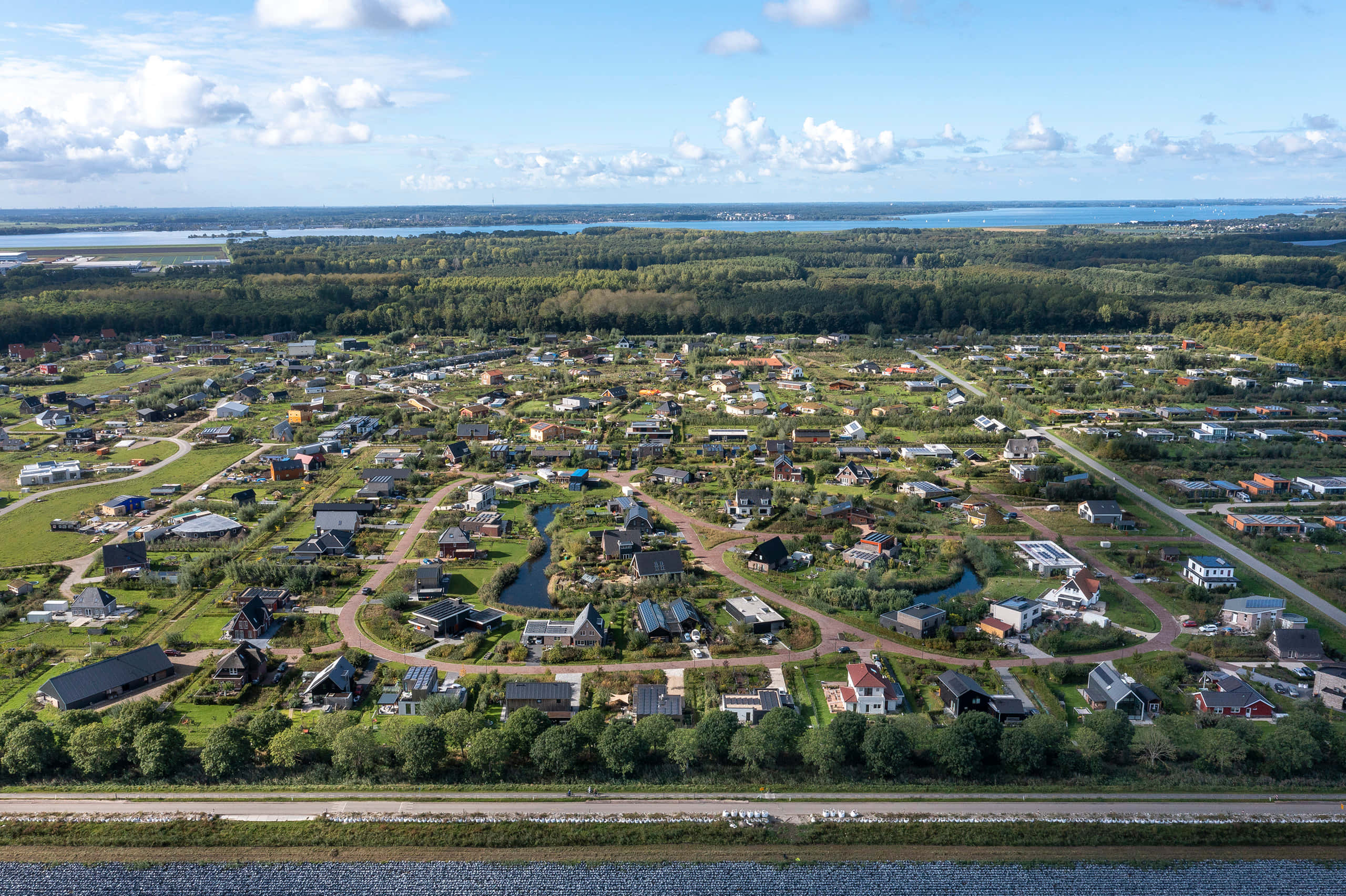 Almere, suburban neighborhood, winding roads, 2K Desktop Wallpaper