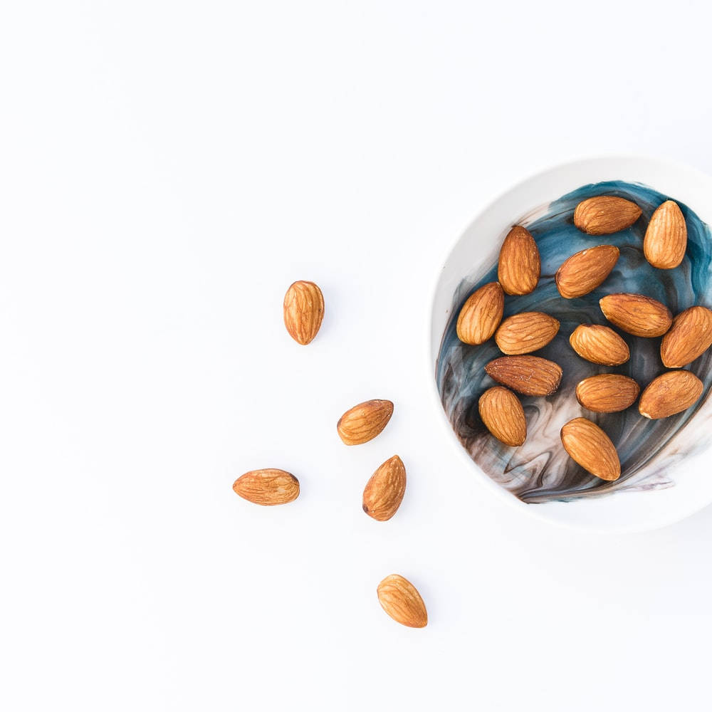 white bowl, blue and gray swirls, almonds, SD Desktop Wallpaper