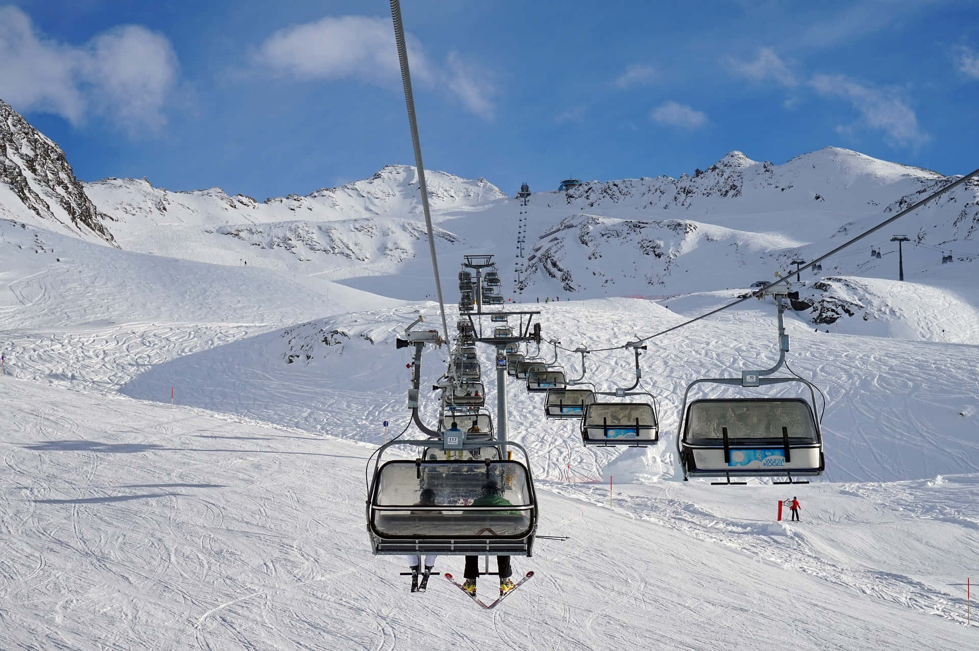ski resort, snow-covered mountains, bright blue sky, Full HD Desktop Wallpaper