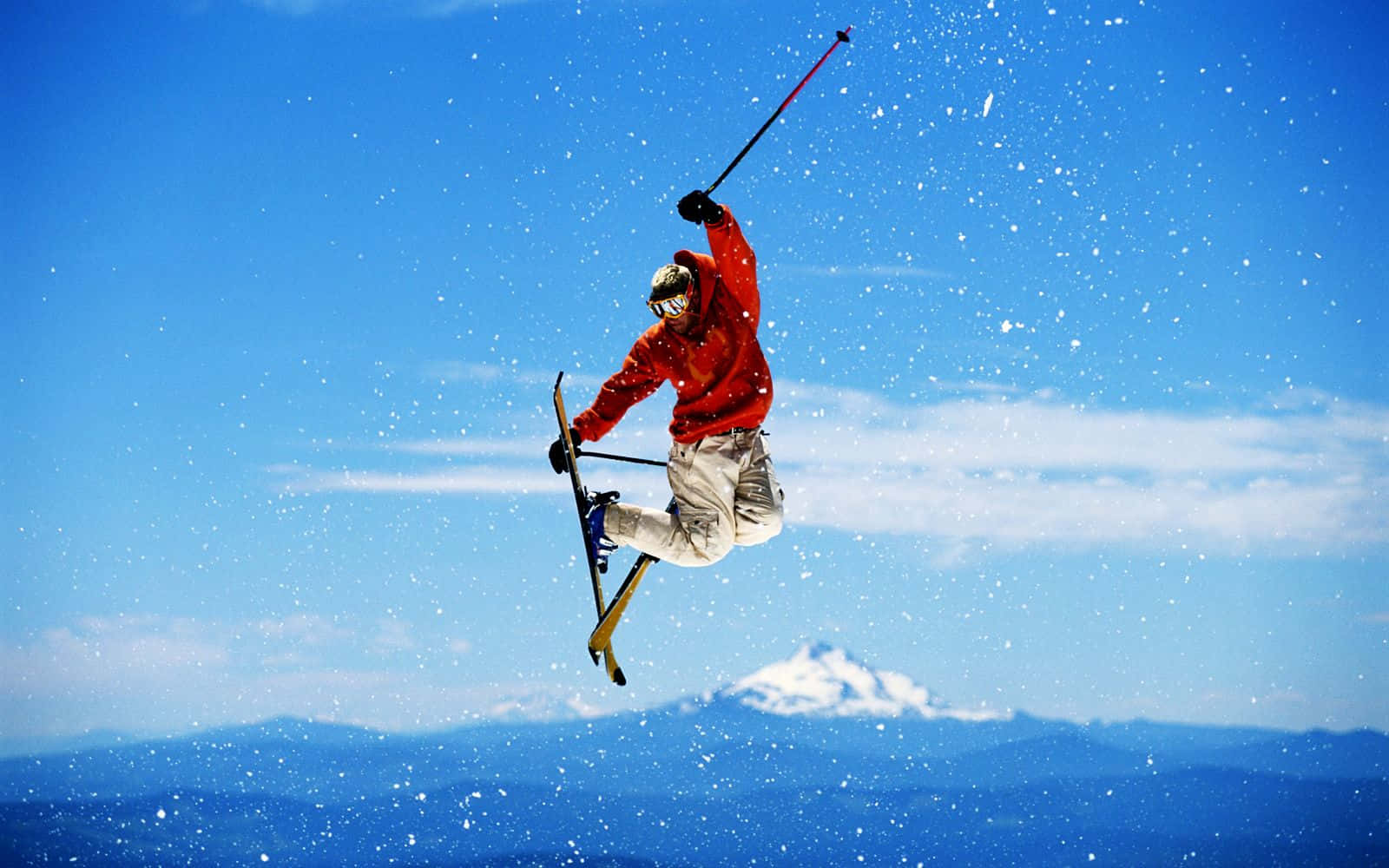 red jacket, snow-covered mountains, bright blue sky, HD Desktop Wallpaper