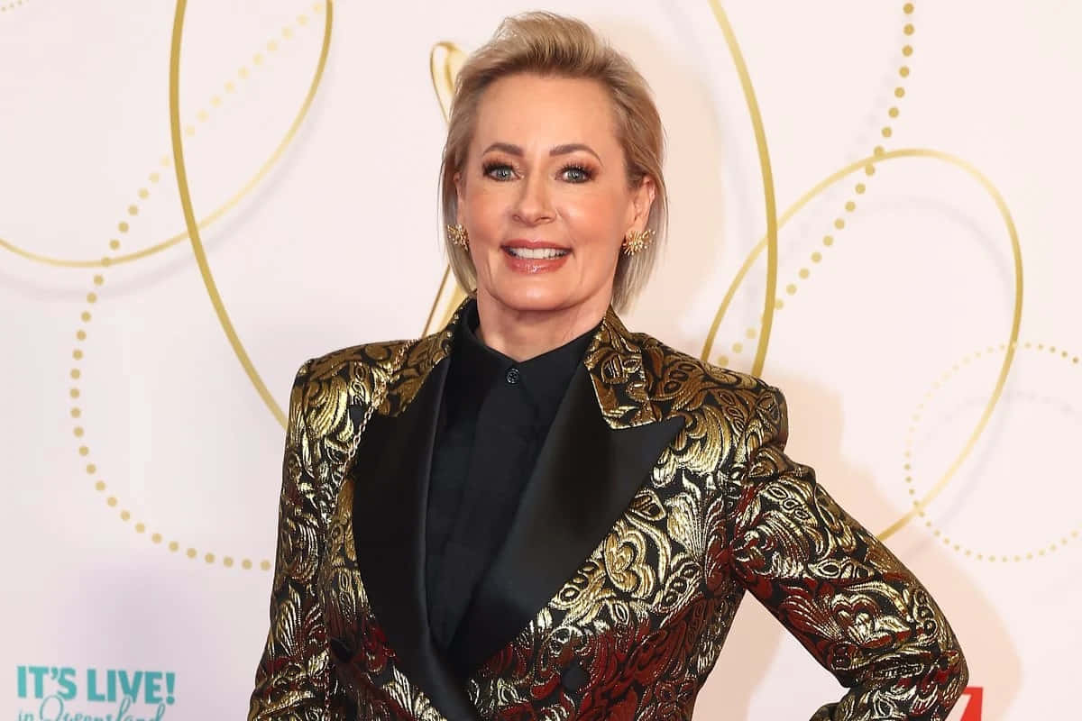 Amanda Keller, gold and black patterned blazer, white backdrop, SD Desktop Wallpaper