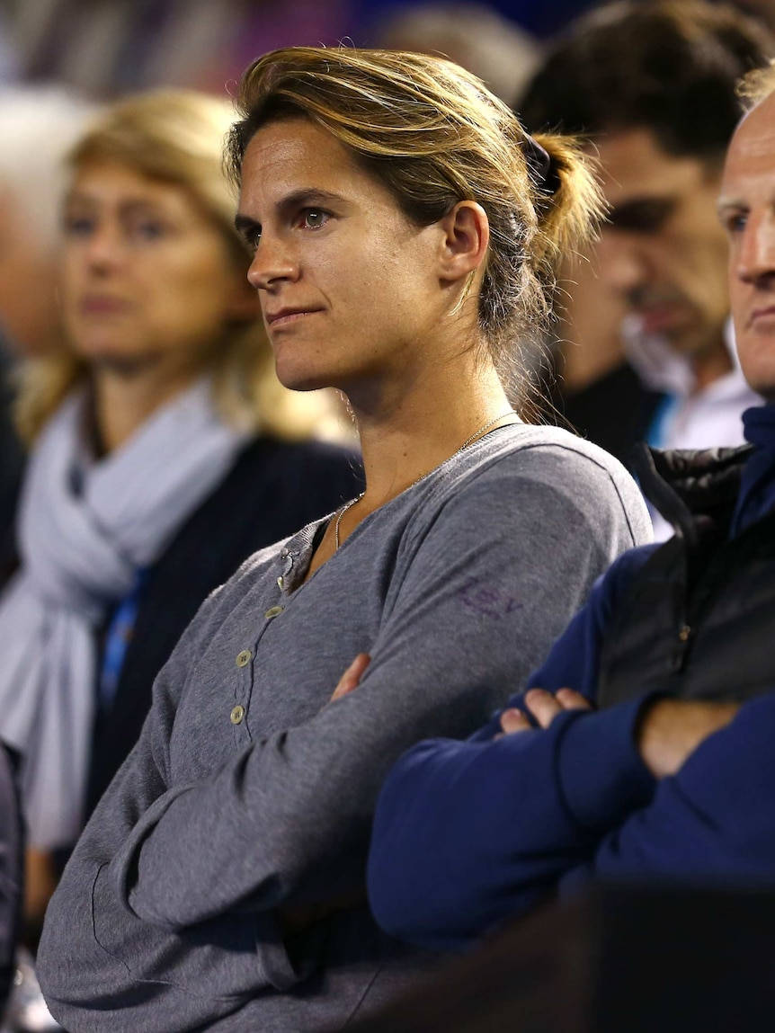 Amélie Mauresmo, arms crossed, stadium seats, SD Phone Wallpaper