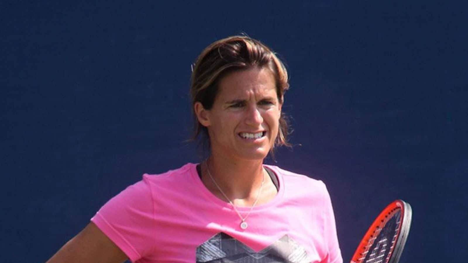 Amélie Mauresmo, bright pink shirt, deep blue court wall, HD Desktop Wallpaper