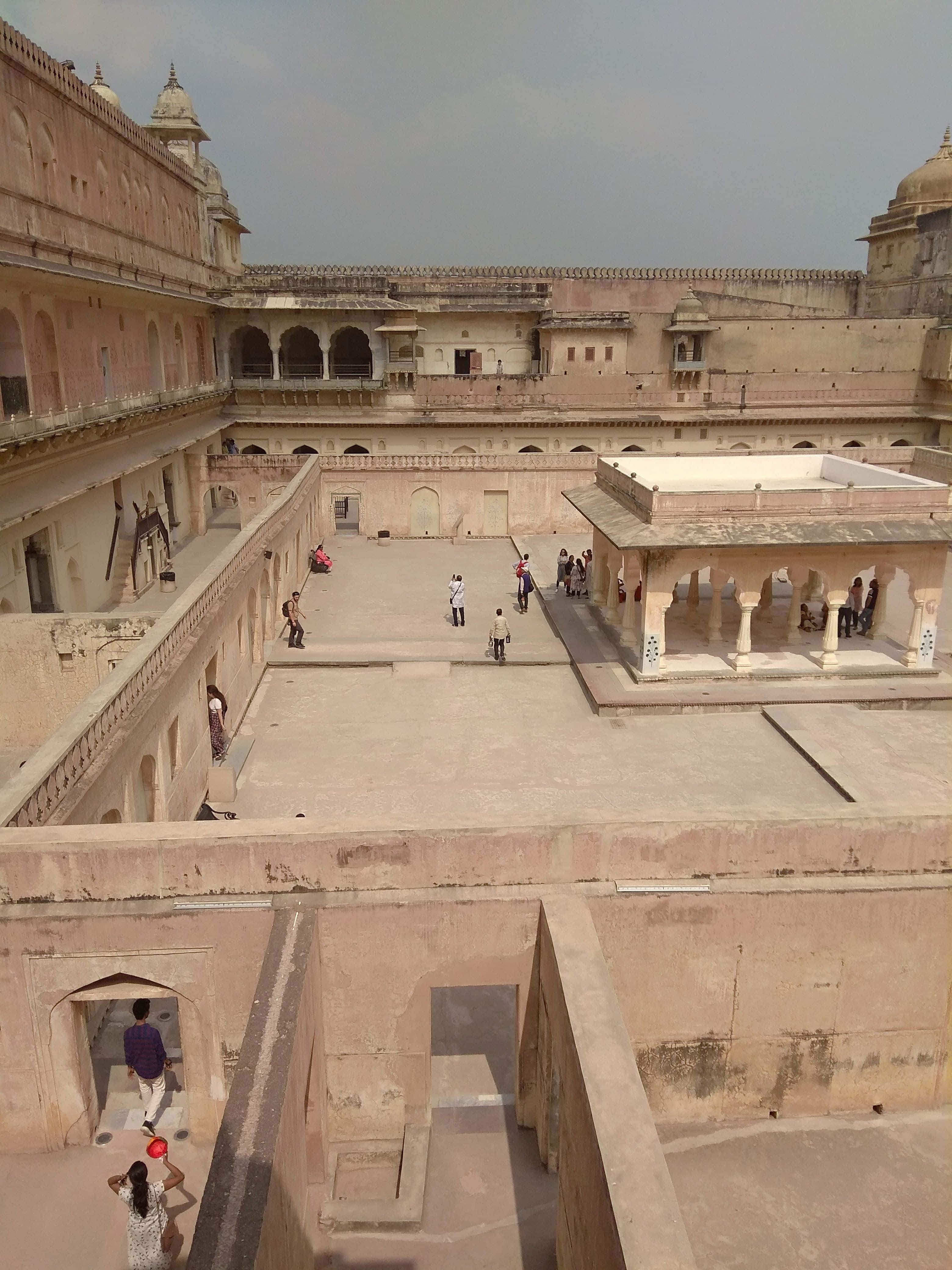 Amer Fort, pink sandstone, sunlit courtyard, 4K Phone Wallpaper