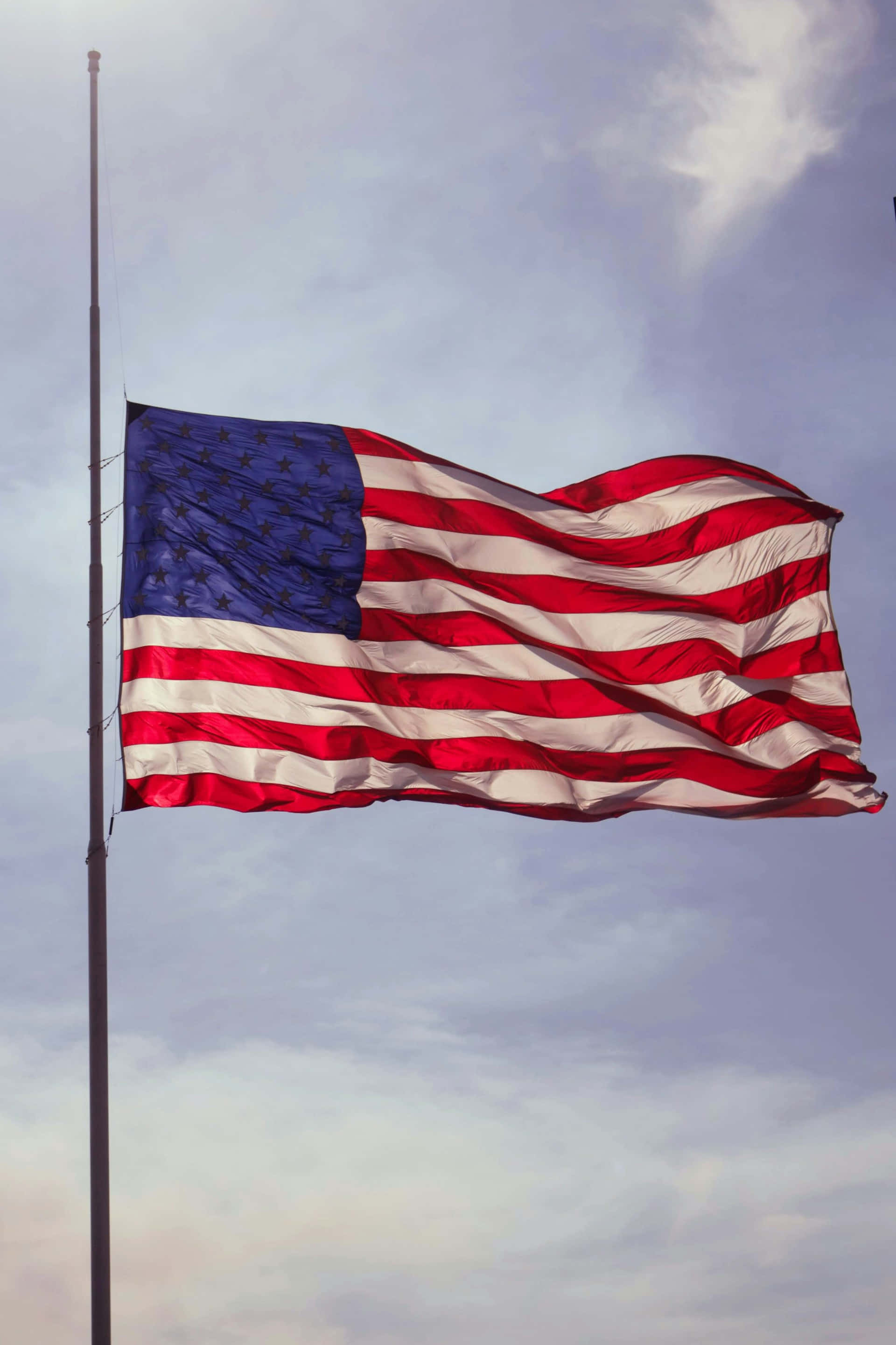 American Flag, half mast, waving in wind, 2K Phone Wallpaper