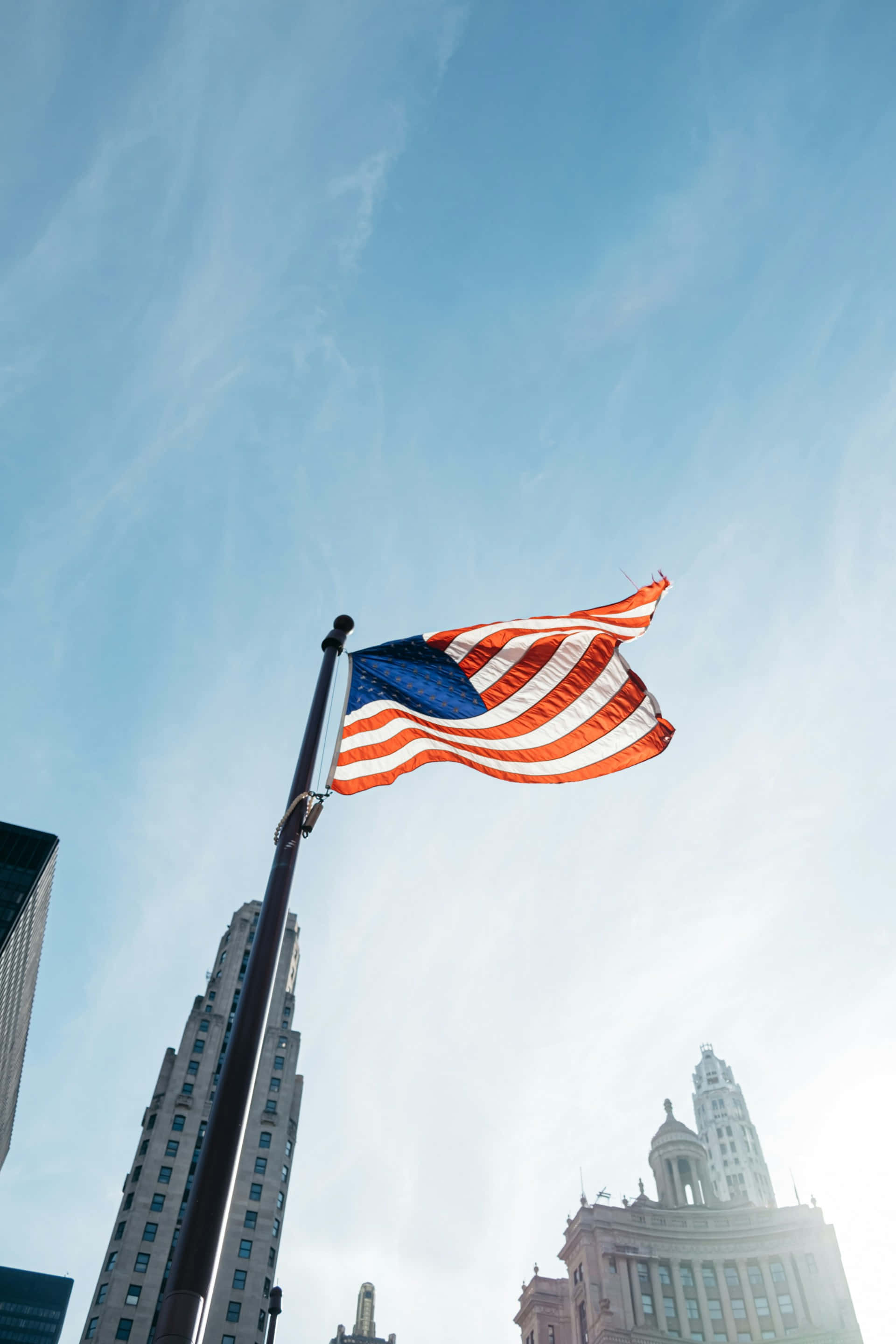 American Flag, clear blue sky, wispy clouds, 2K Phone Wallpaper