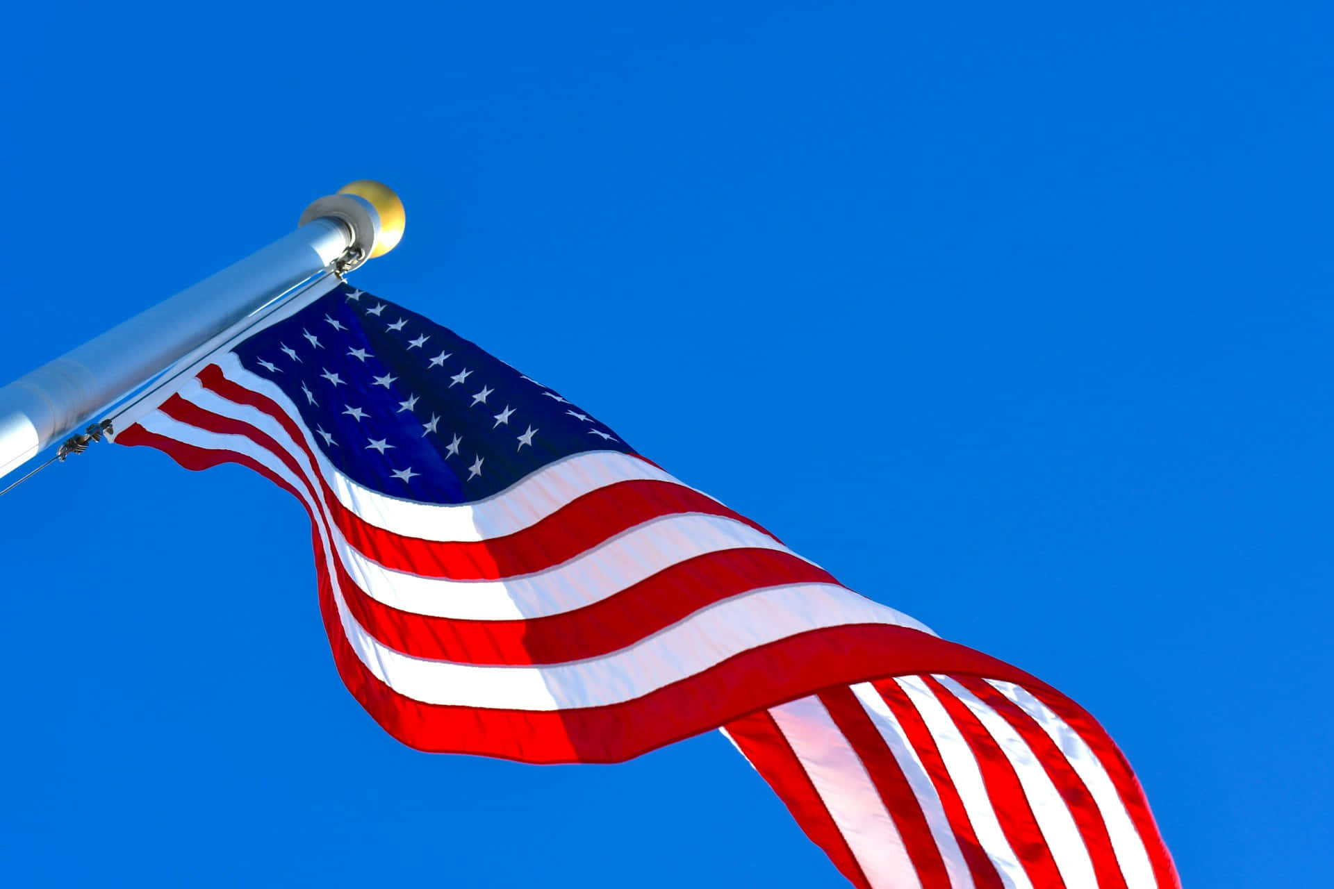 American Flag, stars and stripes, clear vibrant blue sky, Full HD Desktop Wallpaper