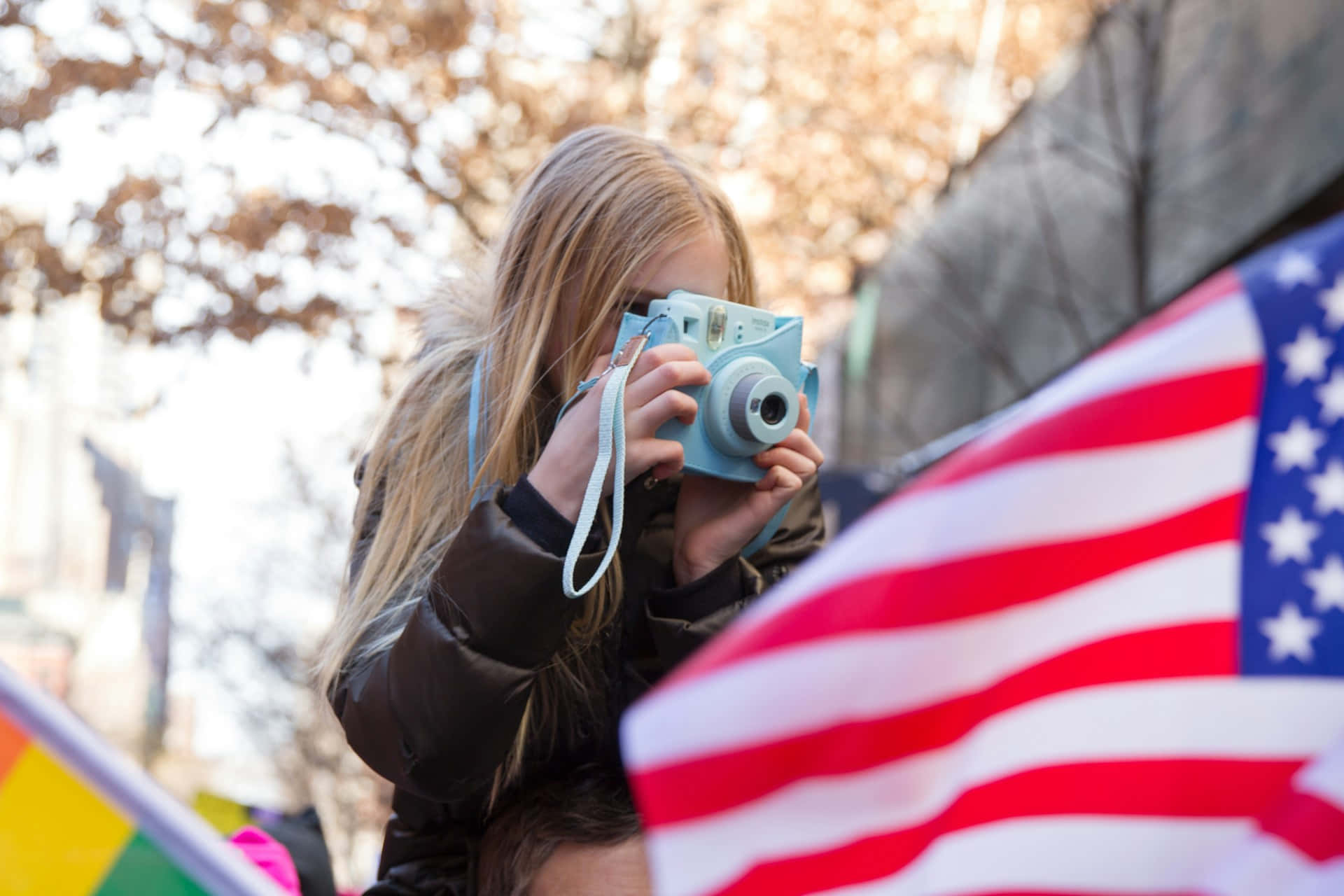 American flag, blonde hair, light blue instant camera, Full HD Desktop Wallpaper