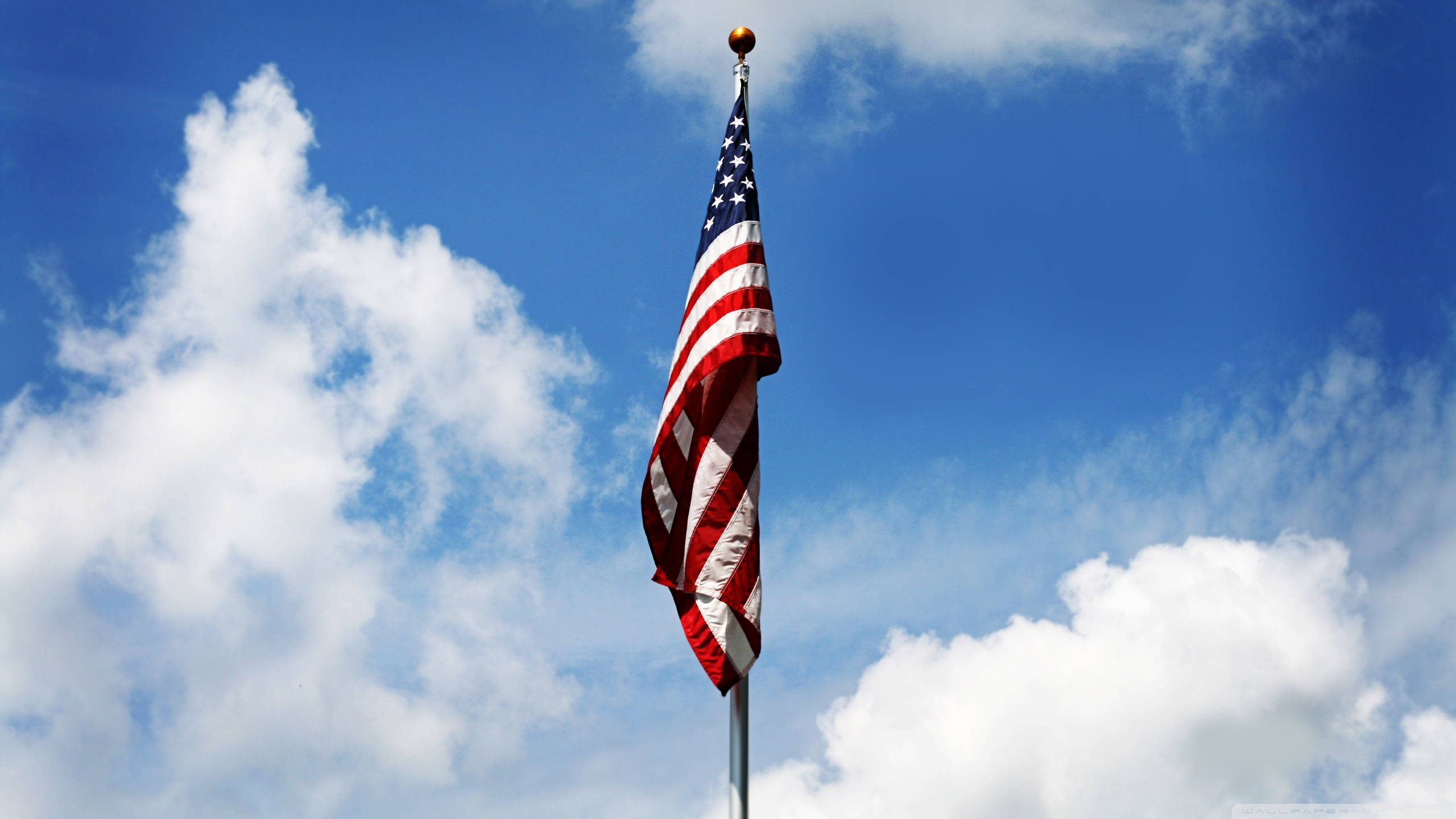 American Flag HD, clear day, bright blue sky, 2K Desktop Wallpaper