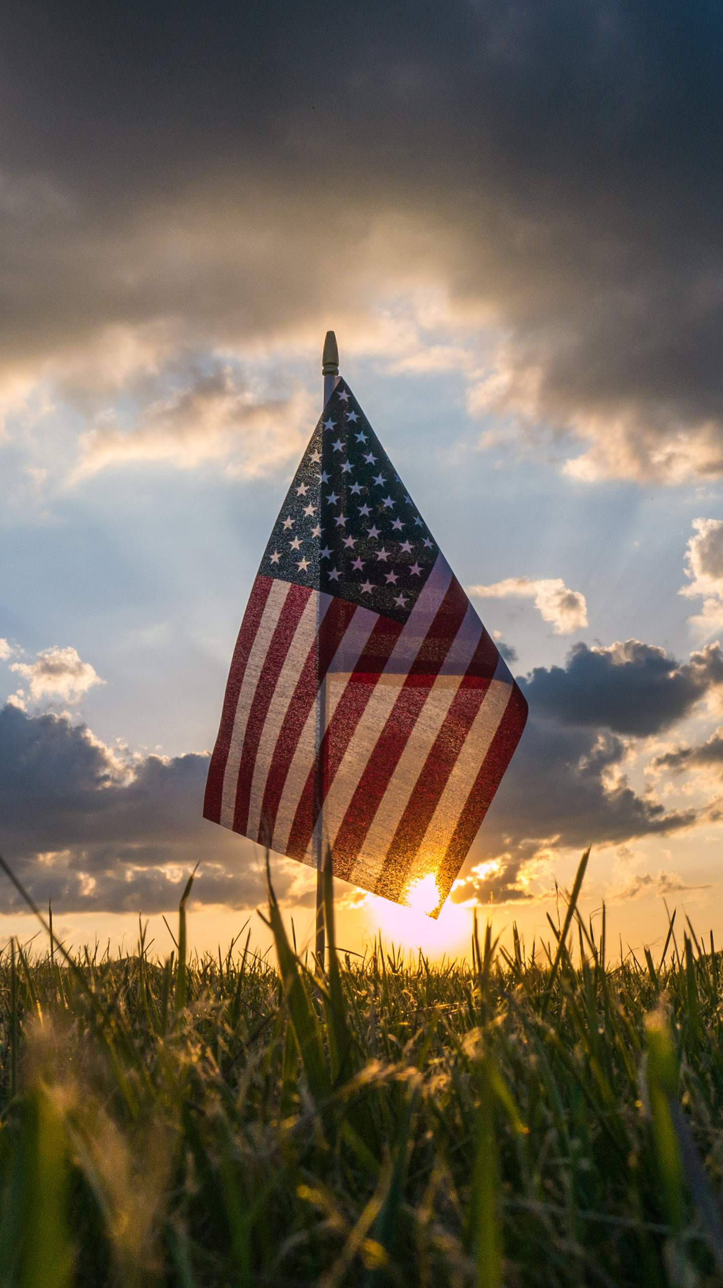 American flag, sunset, grassy field, 2K Phone Wallpaper
