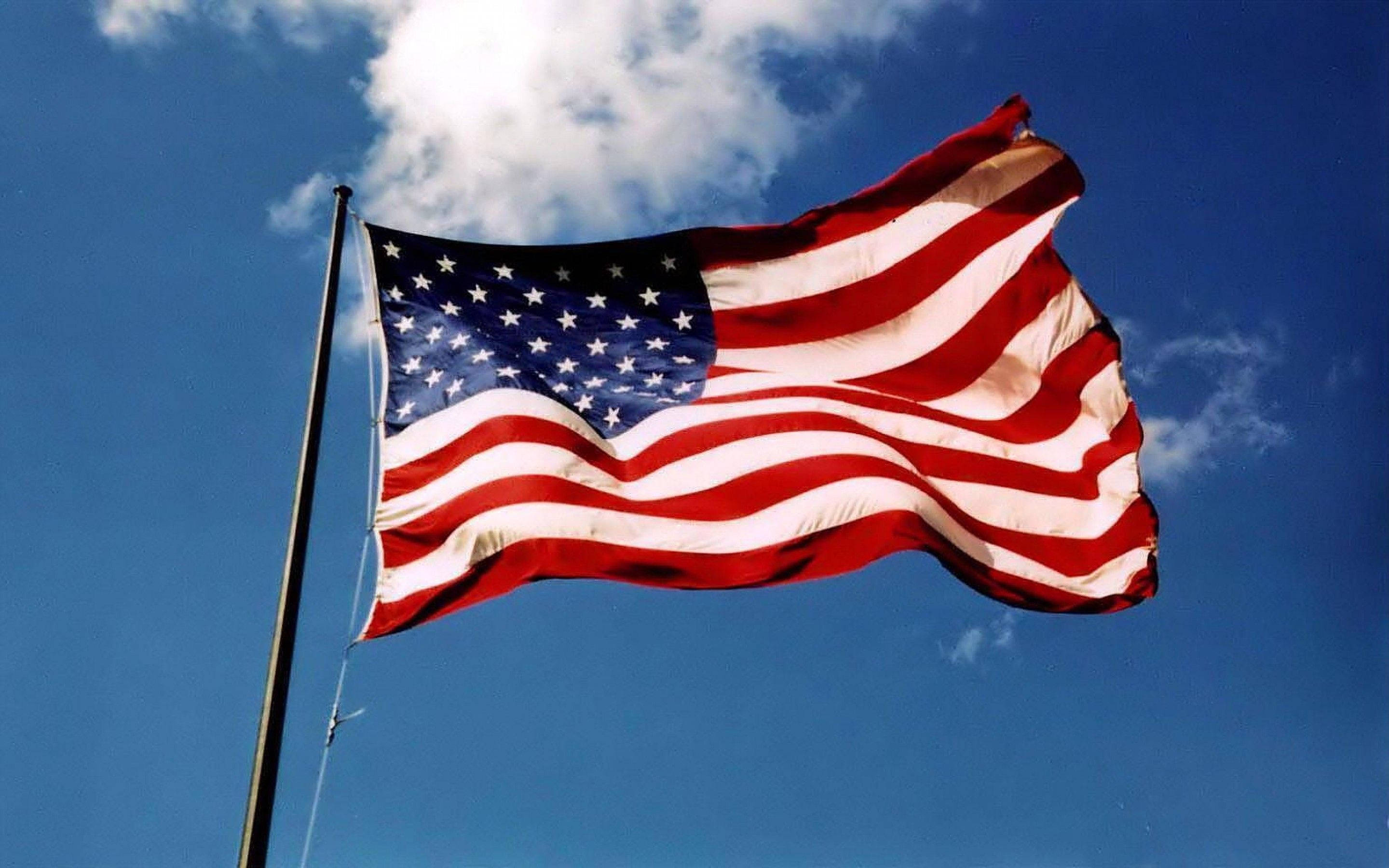 American flag, waving, bright blue sky, 2K Desktop Wallpaper