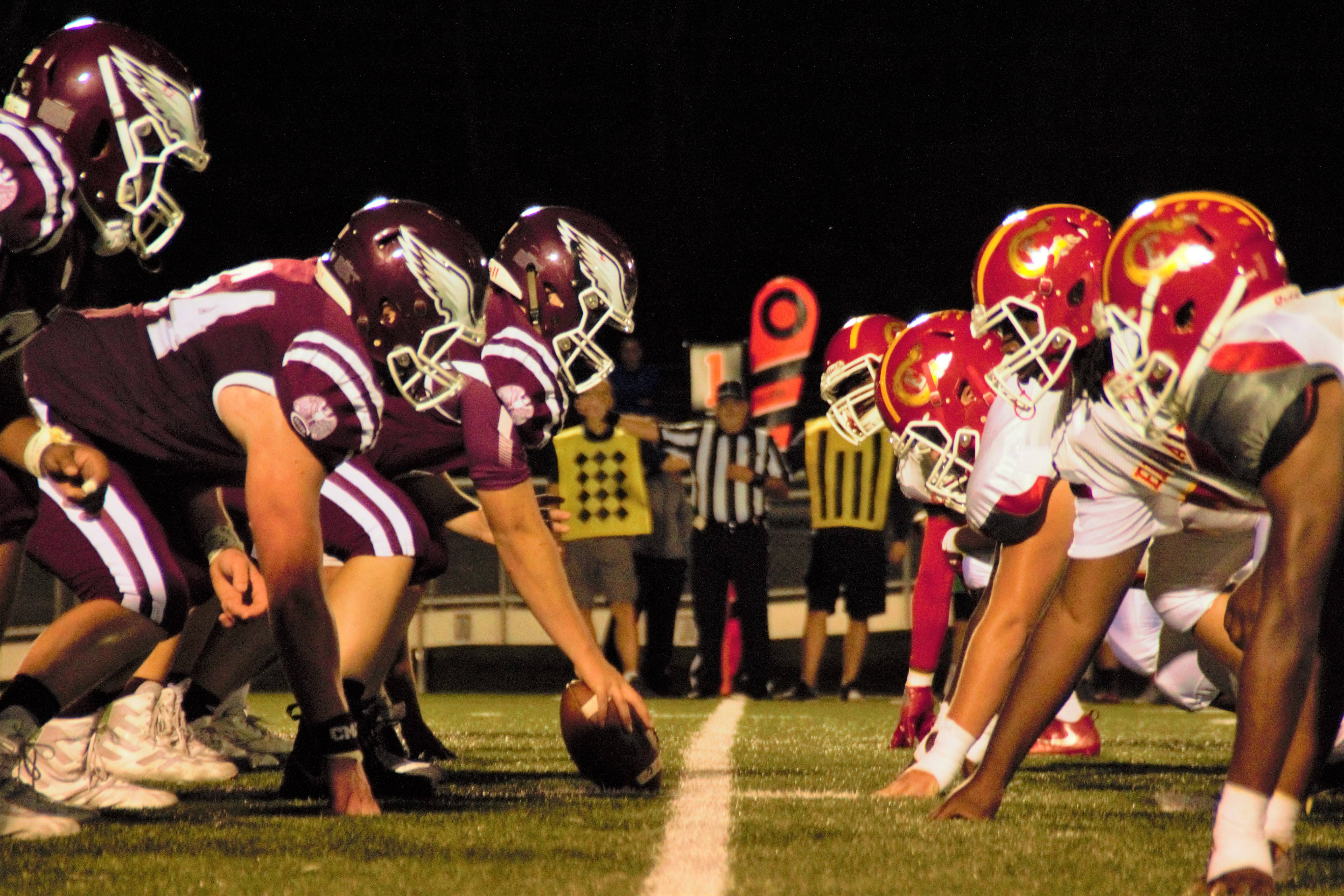 American Football, maroon and red uniforms, lit field, 5K Desktop Wallpaper