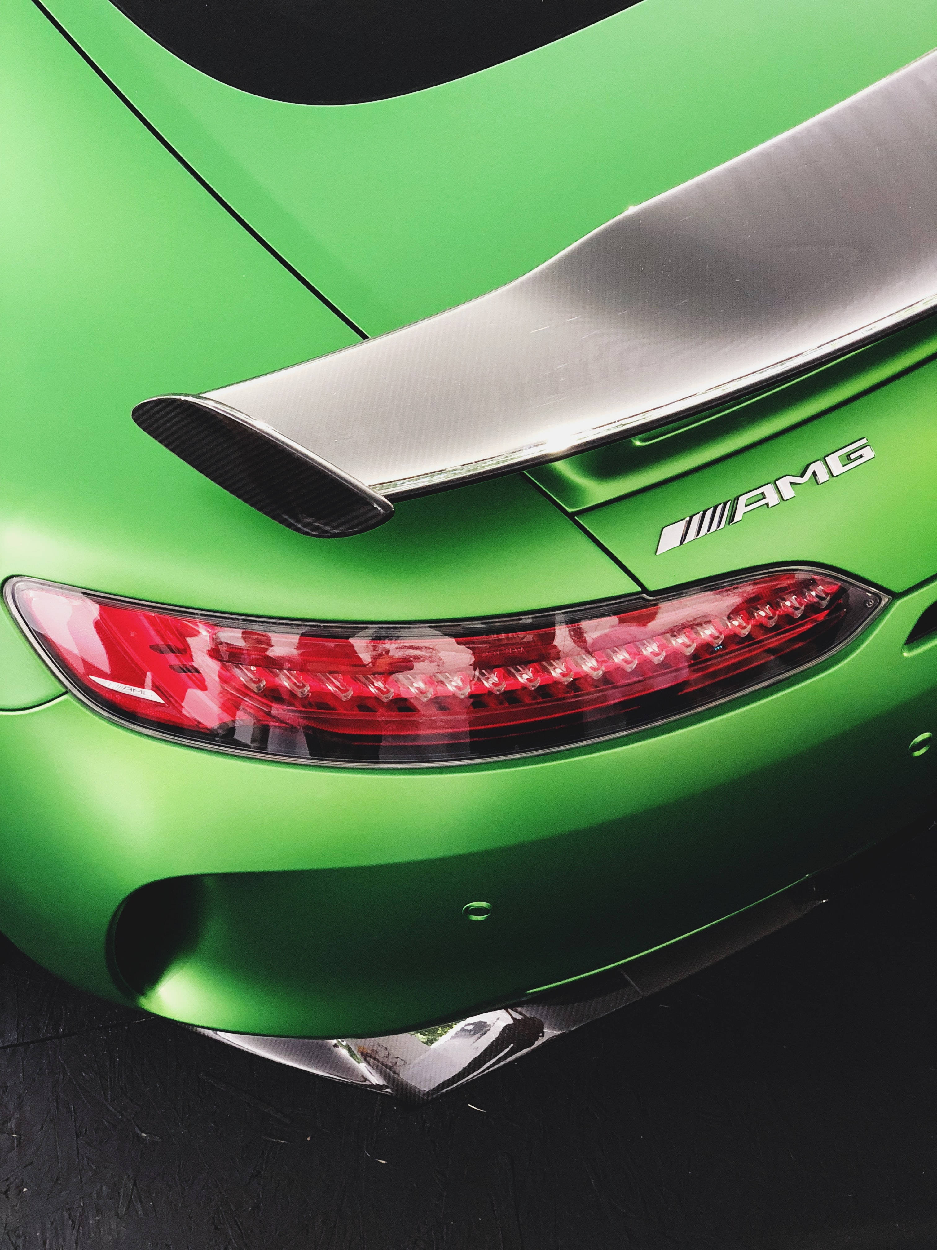 AMG GTR, vibrant green, carbon fiber spoiler, 4K Phone Wallpaper
