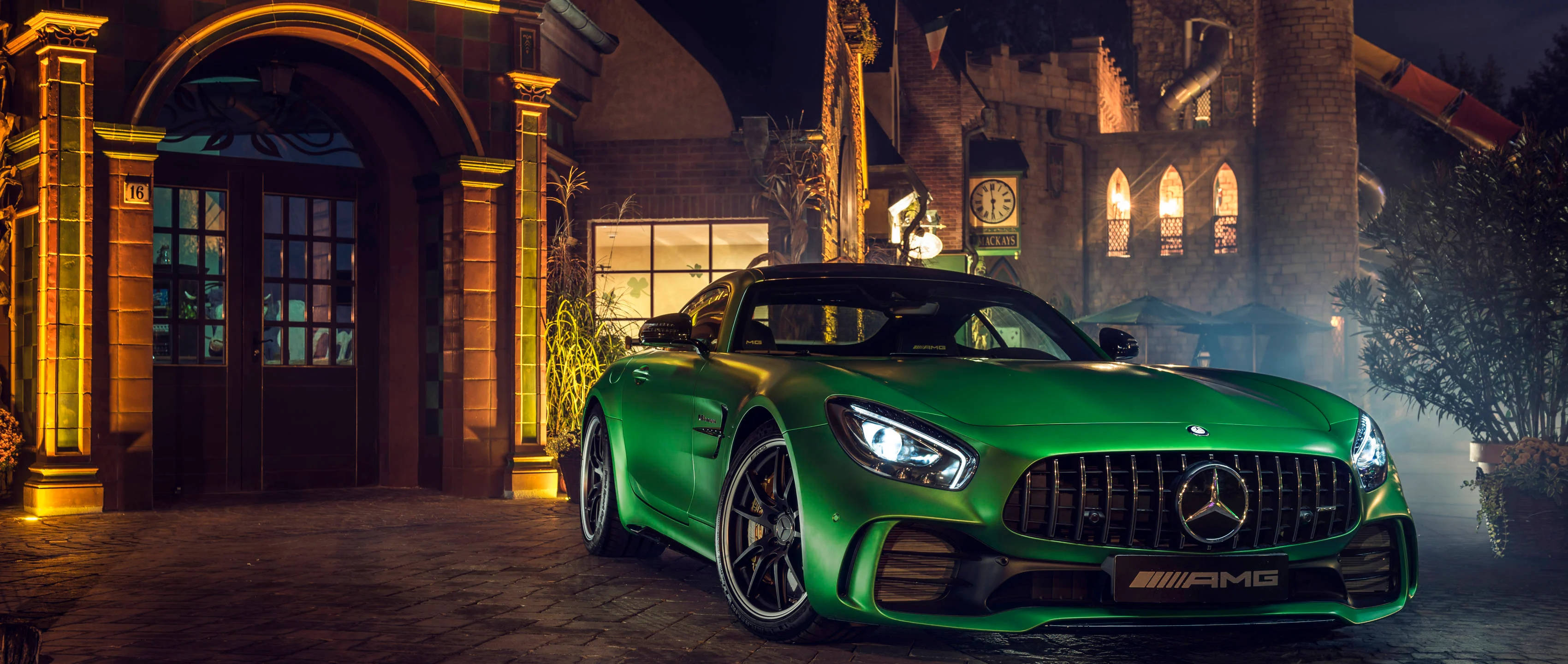 green AMG, sports car, warm night lights, 2K Desktop Wallpaper