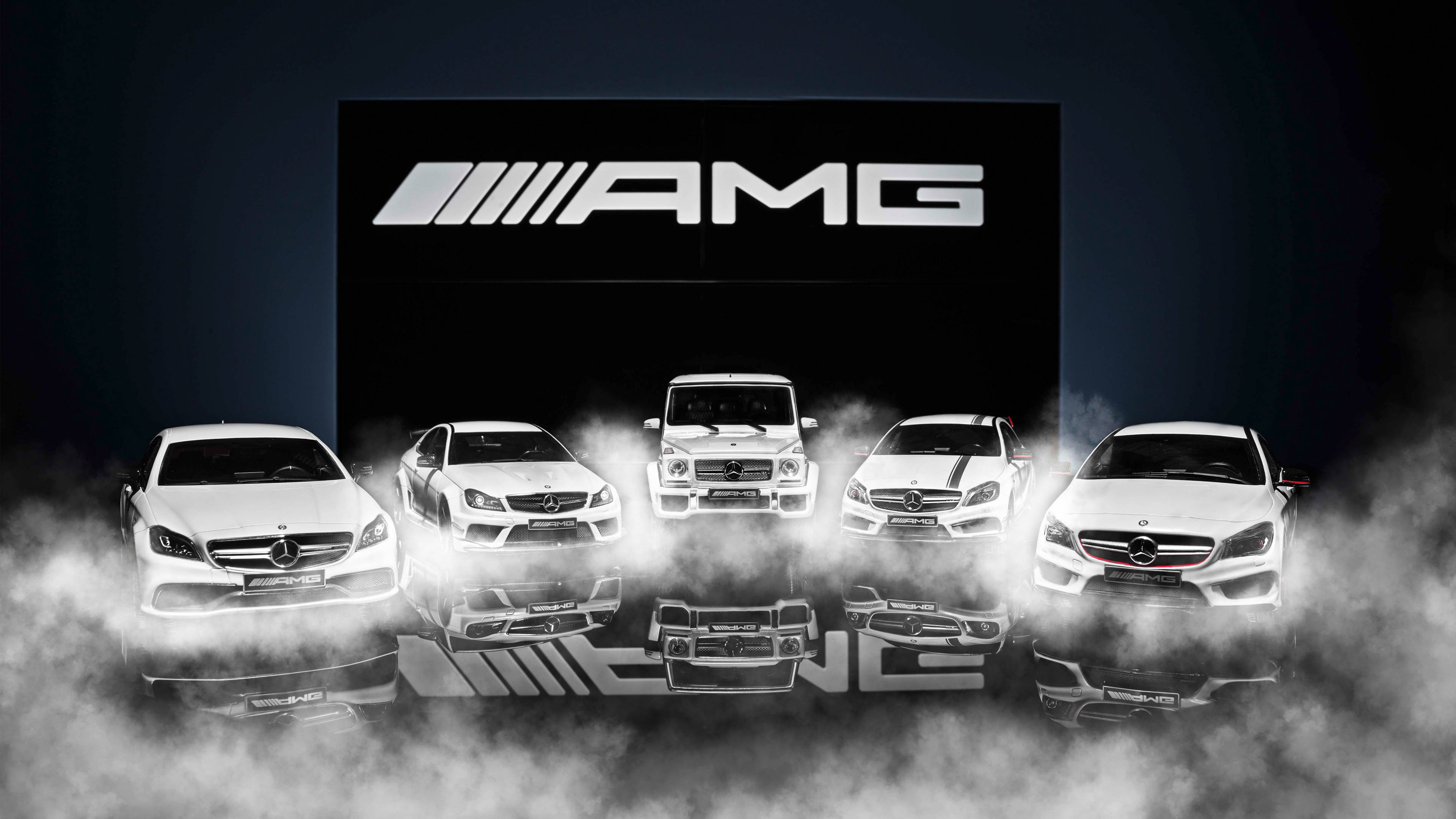 white AMG cars, glowing AMG logo, dark studio setting, 4K Desktop Wallpaper
