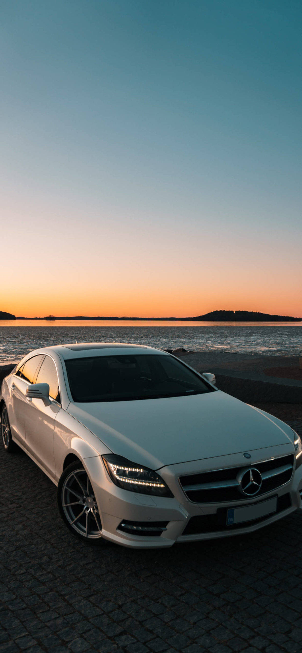 white Mercedes-Benz CLS coupe, sunset, beach, 2K Phone Wallpaper
