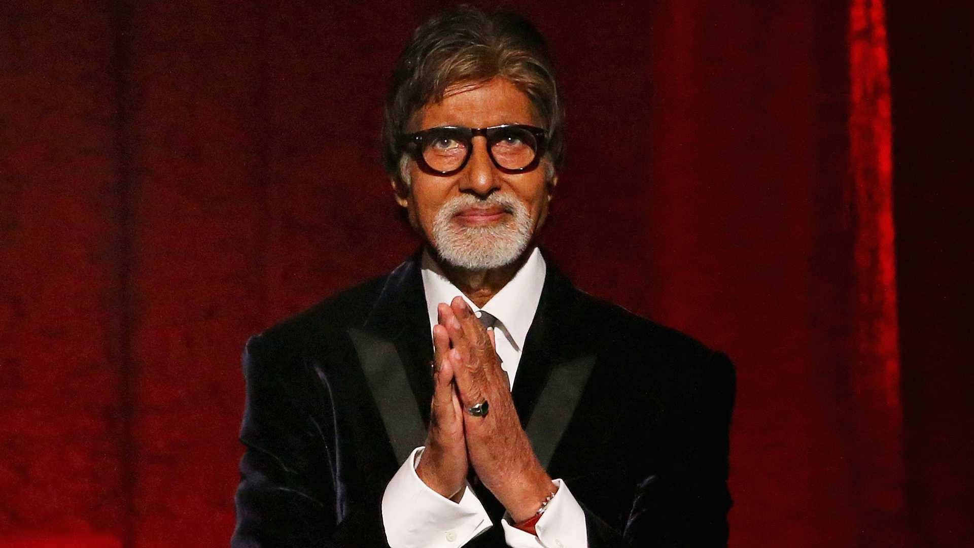 Amitabh Bachchan, black velvet tuxedo, rich red curtain backdrop, Full HD Desktop Wallpaper
