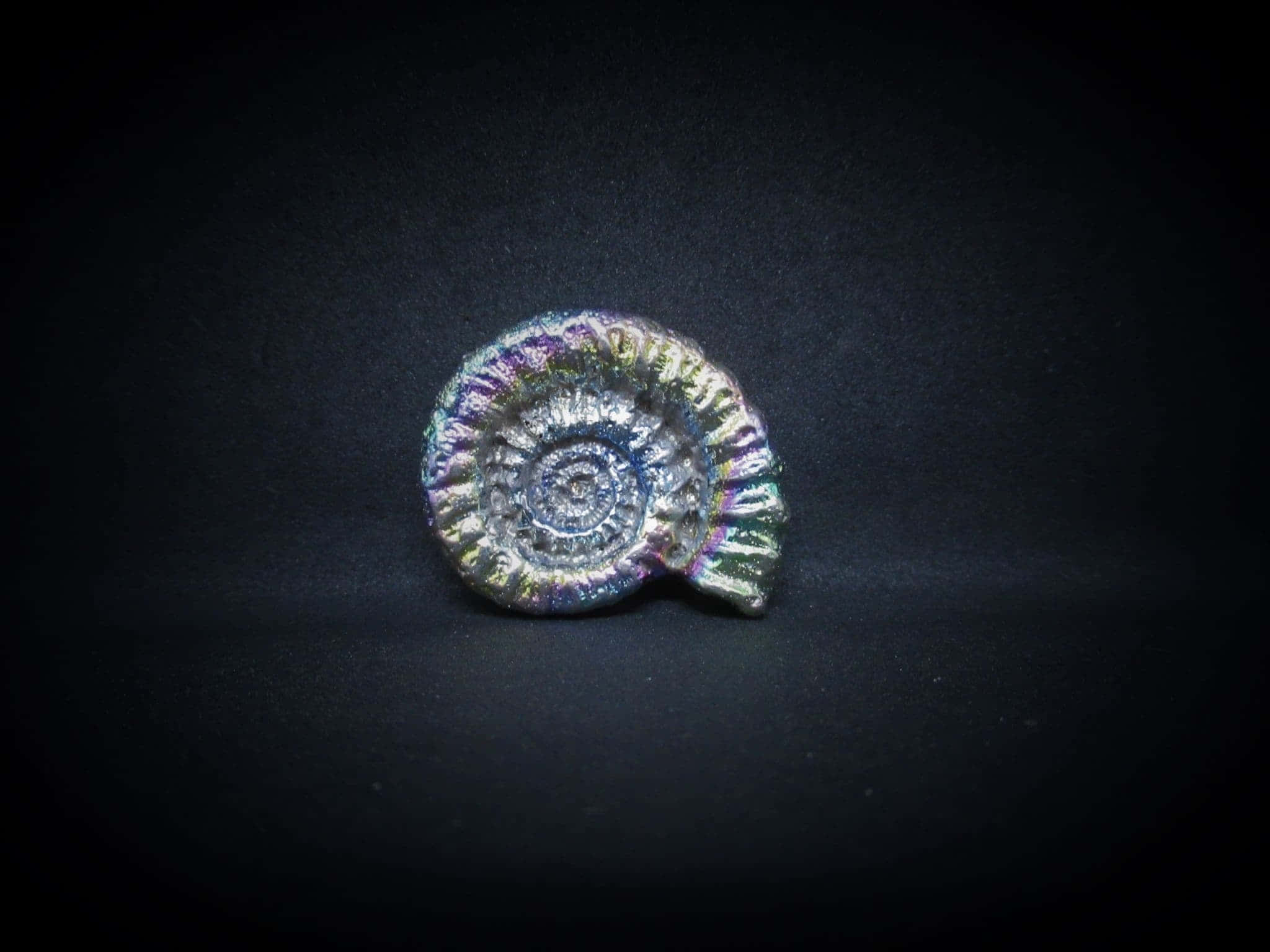 iridescent ammonite fossil, rainbow hues, dark textured surface, Full HD Desktop Wallpaper