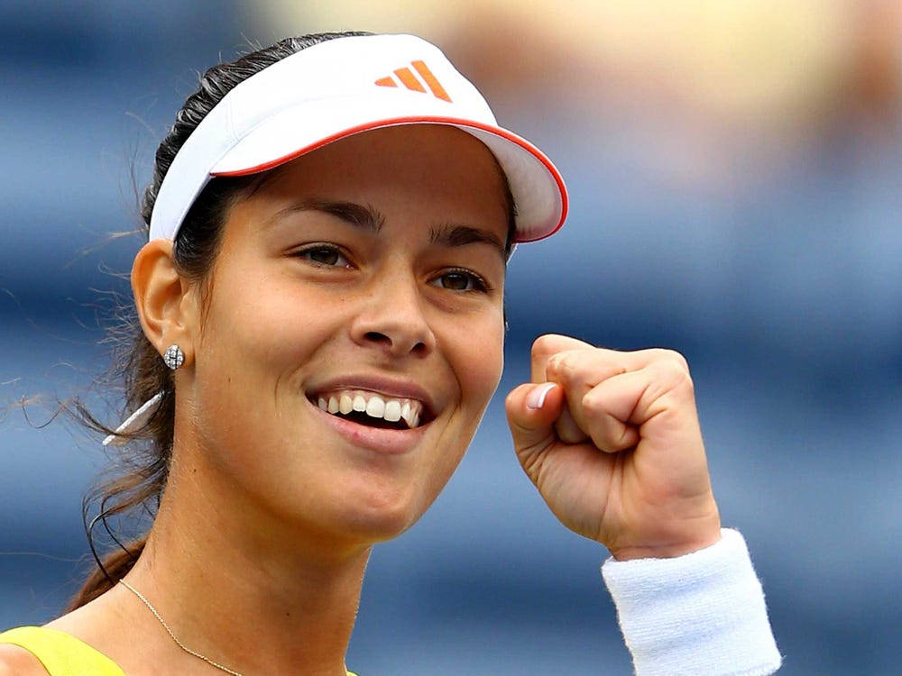 Ana Ivanovic, white visor, yellow top, SD Desktop Wallpaper