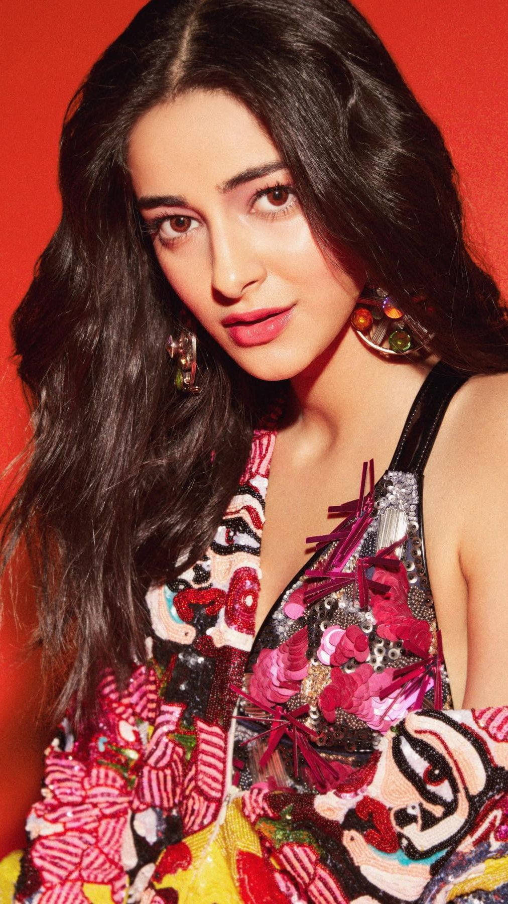 Ananya Pandey, colorful sequined top, vibrant red background, HD Phone Wallpaper