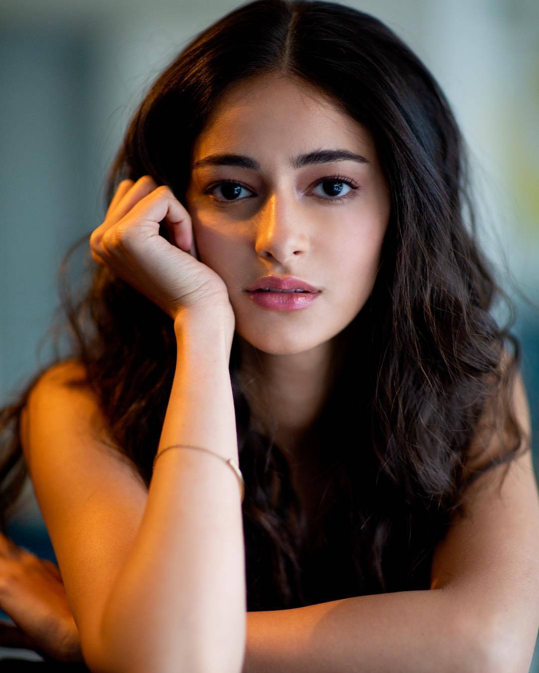 Ananya Pandey, dark wavy hair, gazing directly at the camera, HD Phone Wallpaper