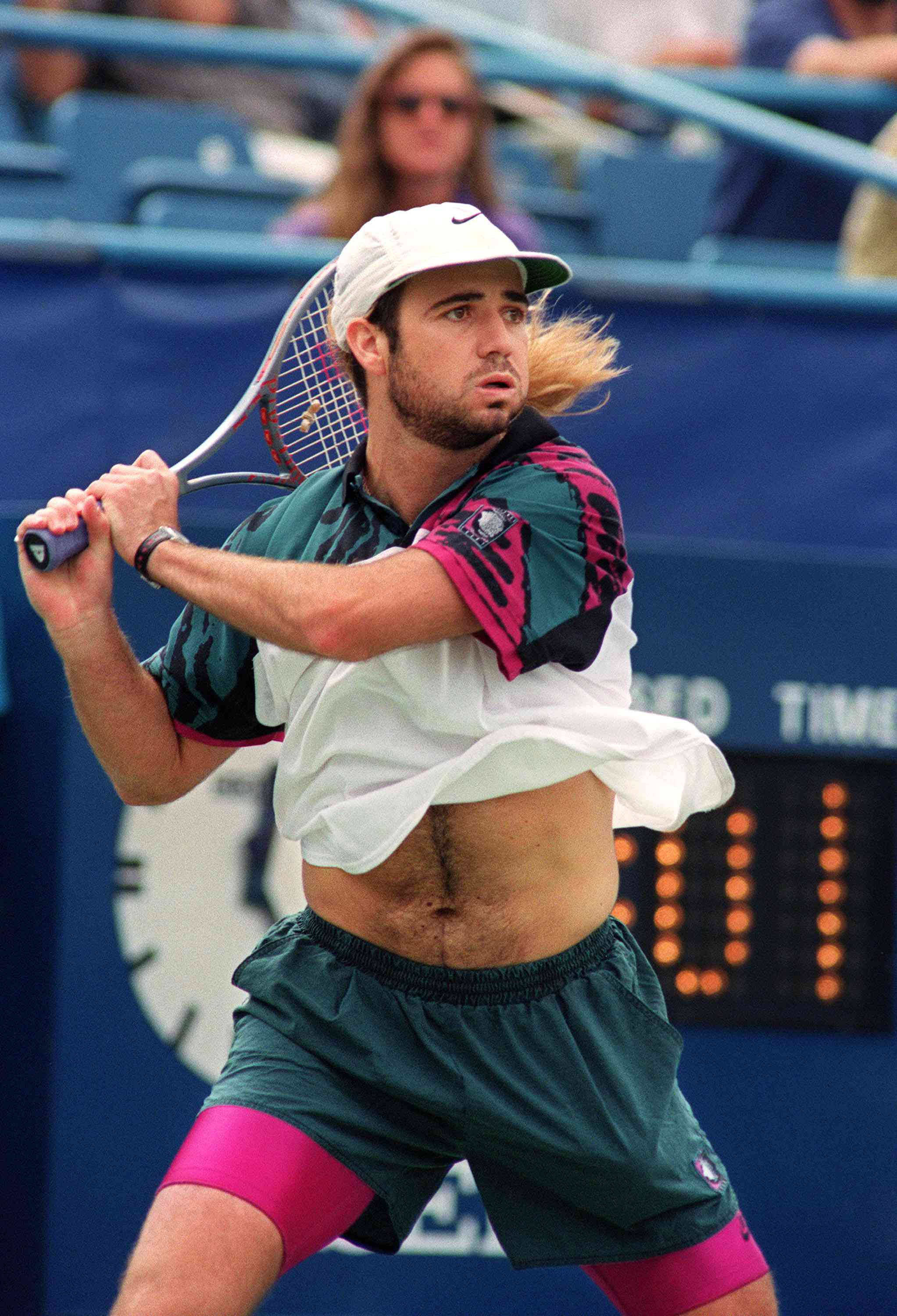 Andre Agassi, tennis player, mid-swing, 2K Phone Wallpaper