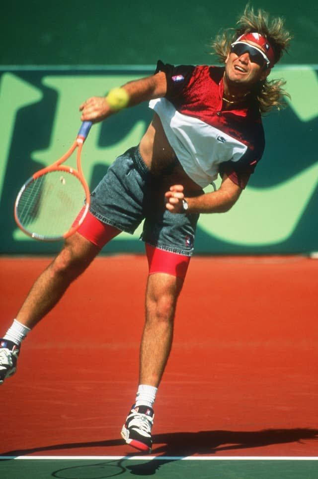 Andre Agassi, red court, green backdrop, SD Phone Wallpaper