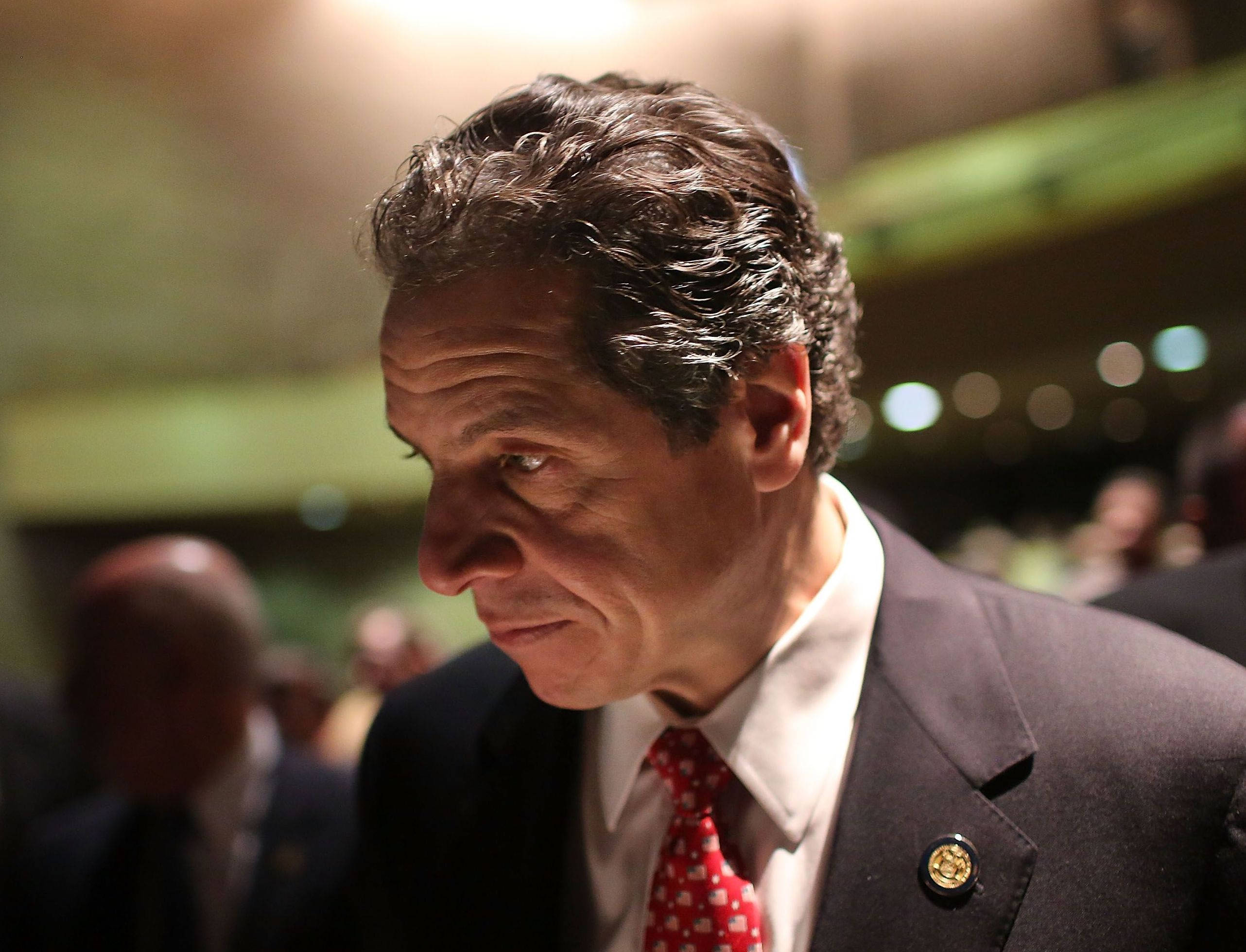Andrew Cuomo, dark suit, red patterned tie, 2K Desktop Wallpaper