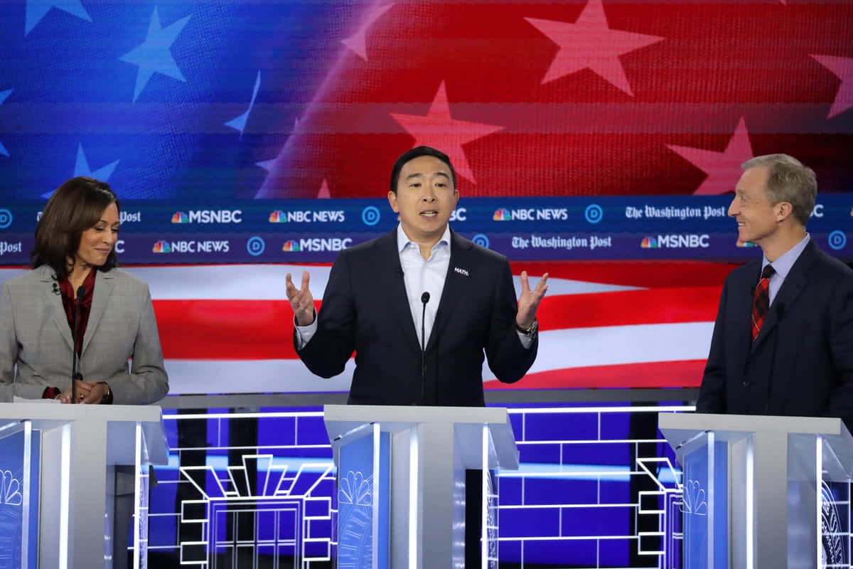 Andrew Yang, debate stage, American flag backdrop, SD Desktop Wallpaper