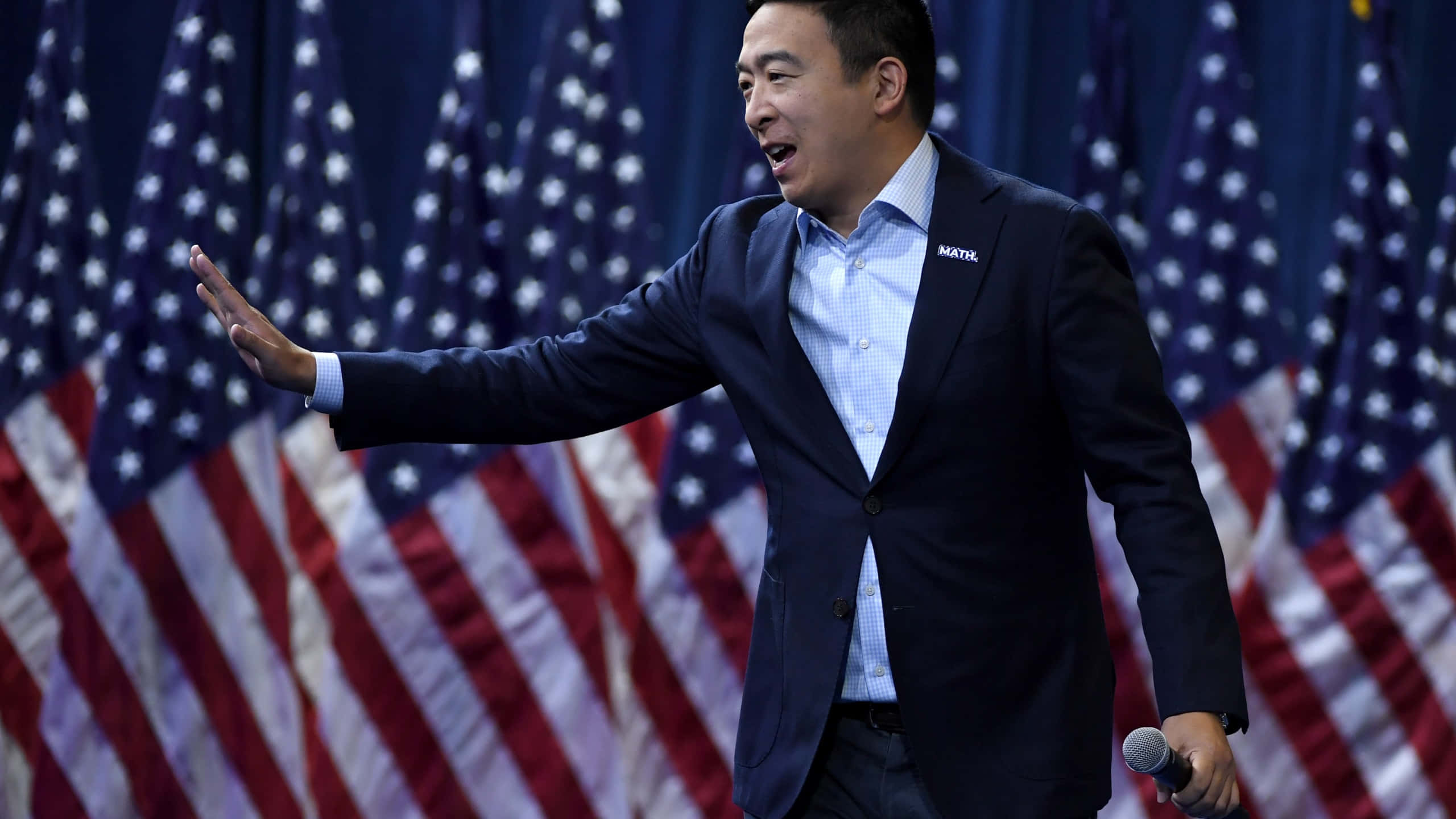 Andrew Yang, American flags, suit, 2K Desktop Wallpaper