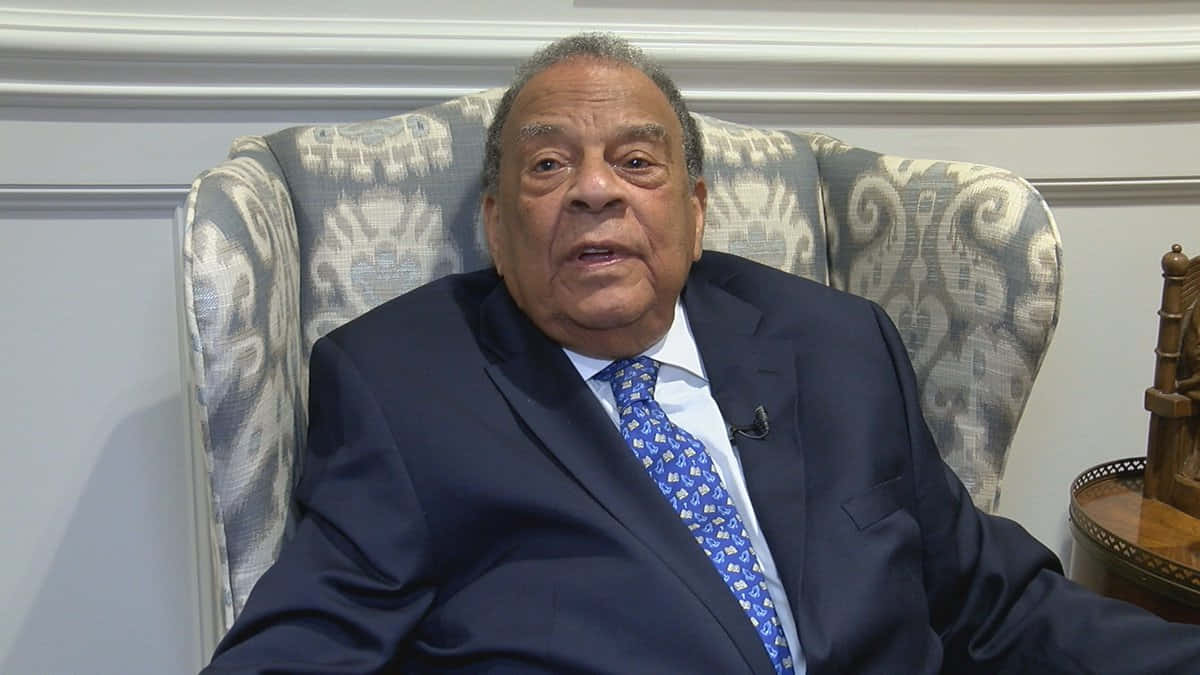 Andrew Young, dark suit, blue patterned tie, SD Desktop Wallpaper