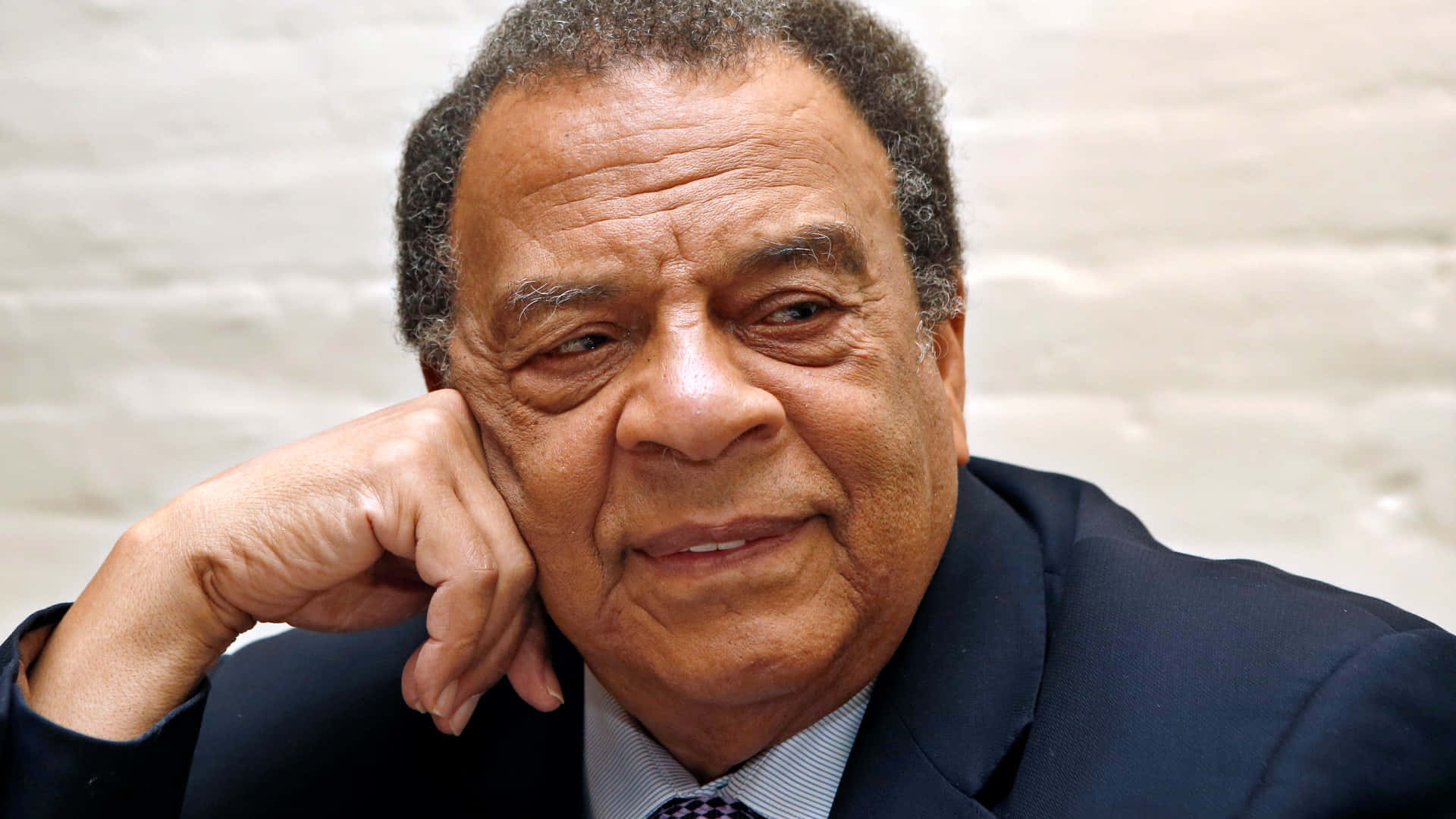 Andrew Young, dark suit, white brick wall, Full HD Desktop Wallpaper