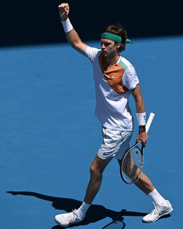Andrey Rublev, raised hand, bright blue court, SD Phone Wallpaper