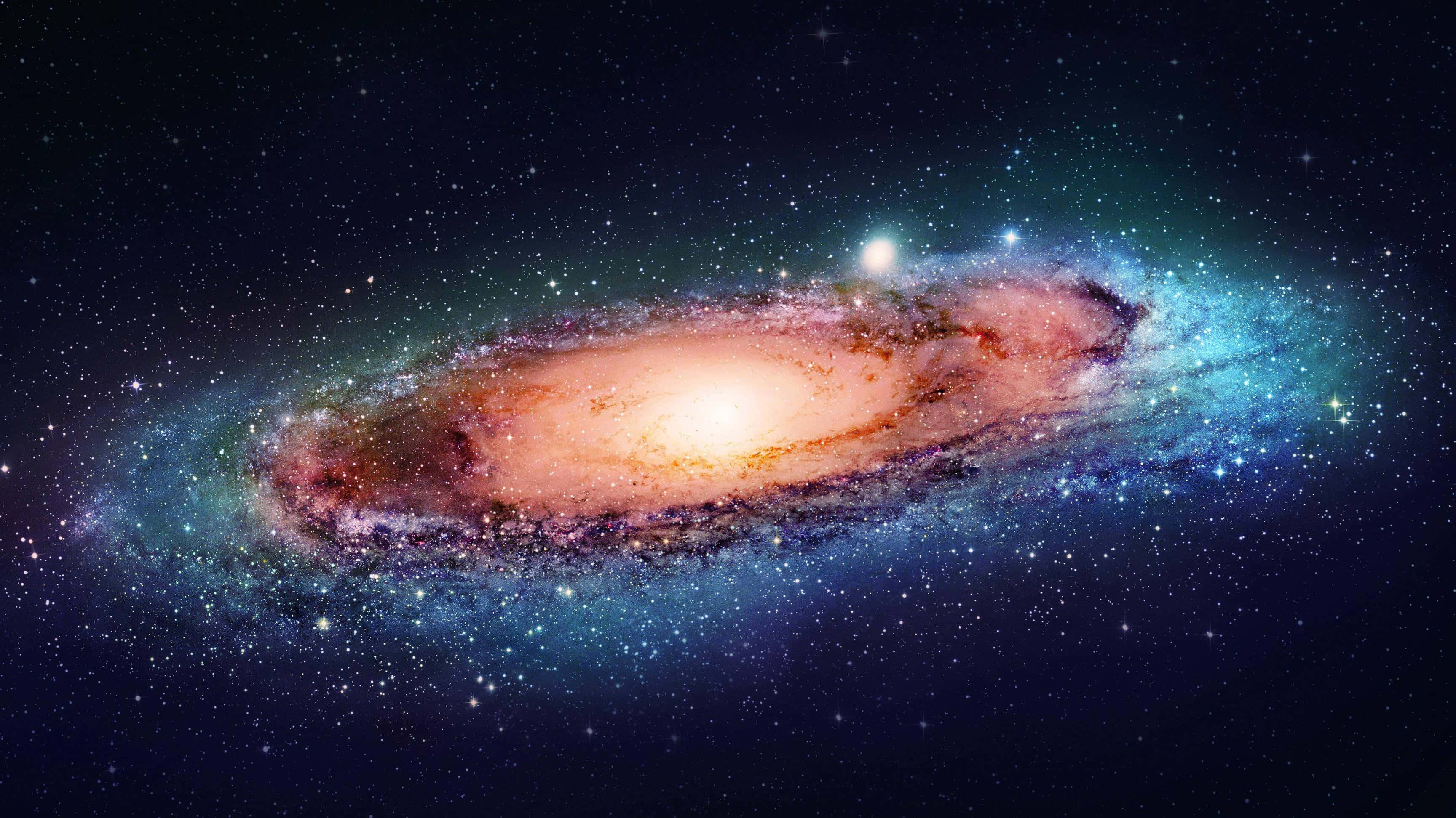 Android Space, spiral galaxy, warm orange, 2K Desktop Wallpaper