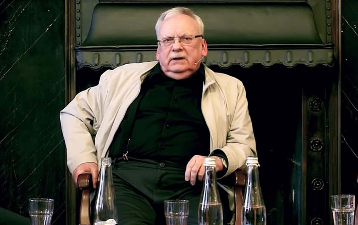 Andrzej Sapkowski, Polish fantasy author, dark green leather chair, SD Desktop Wallpaper