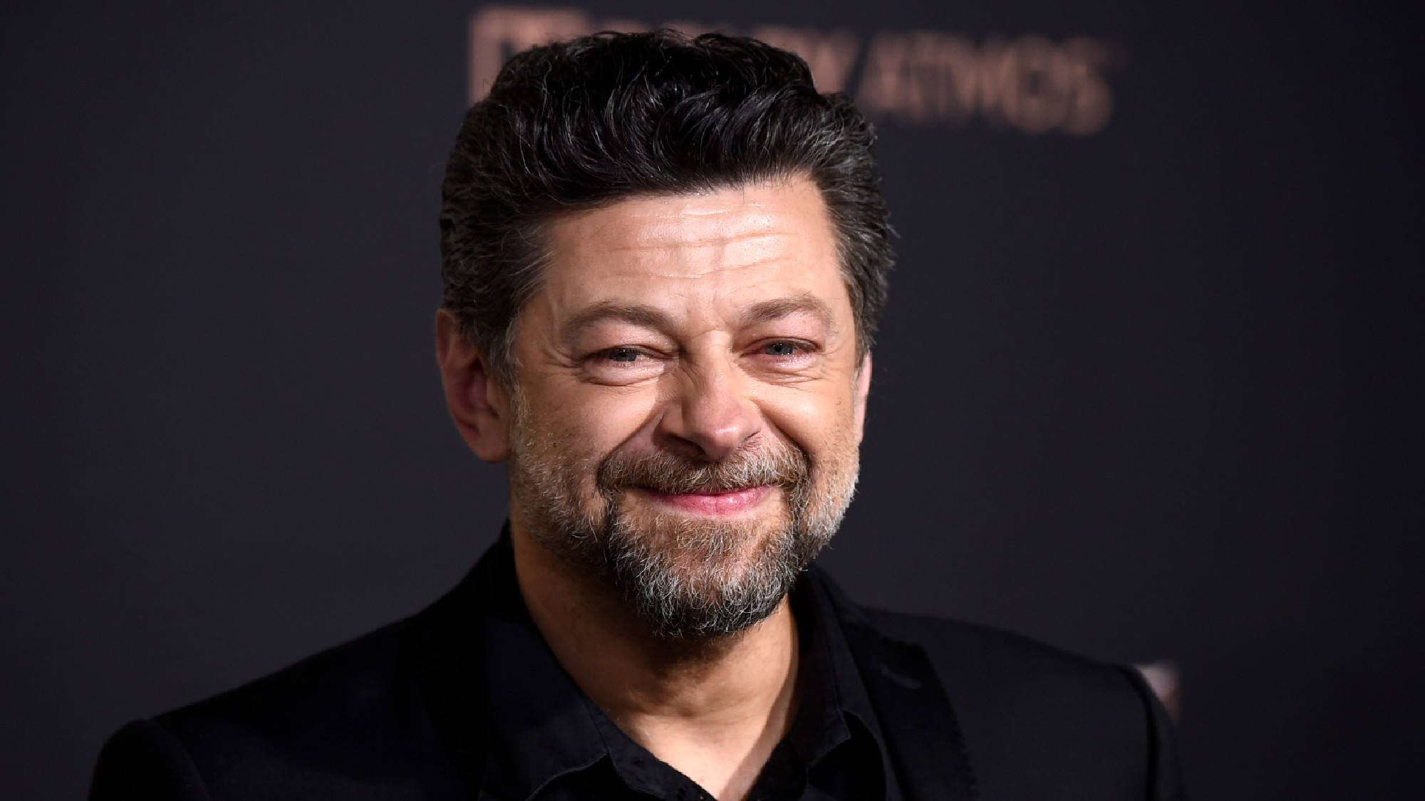 Andy Serkis, dark backdrop, faint text, Full HD Desktop Wallpaper