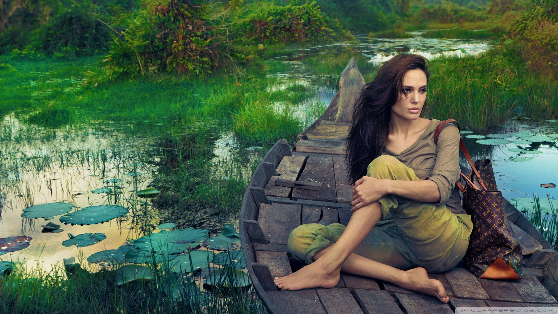 Angelina Jolie, weathered wooden boat, lush green swamp, Full HD Desktop Wallpaper