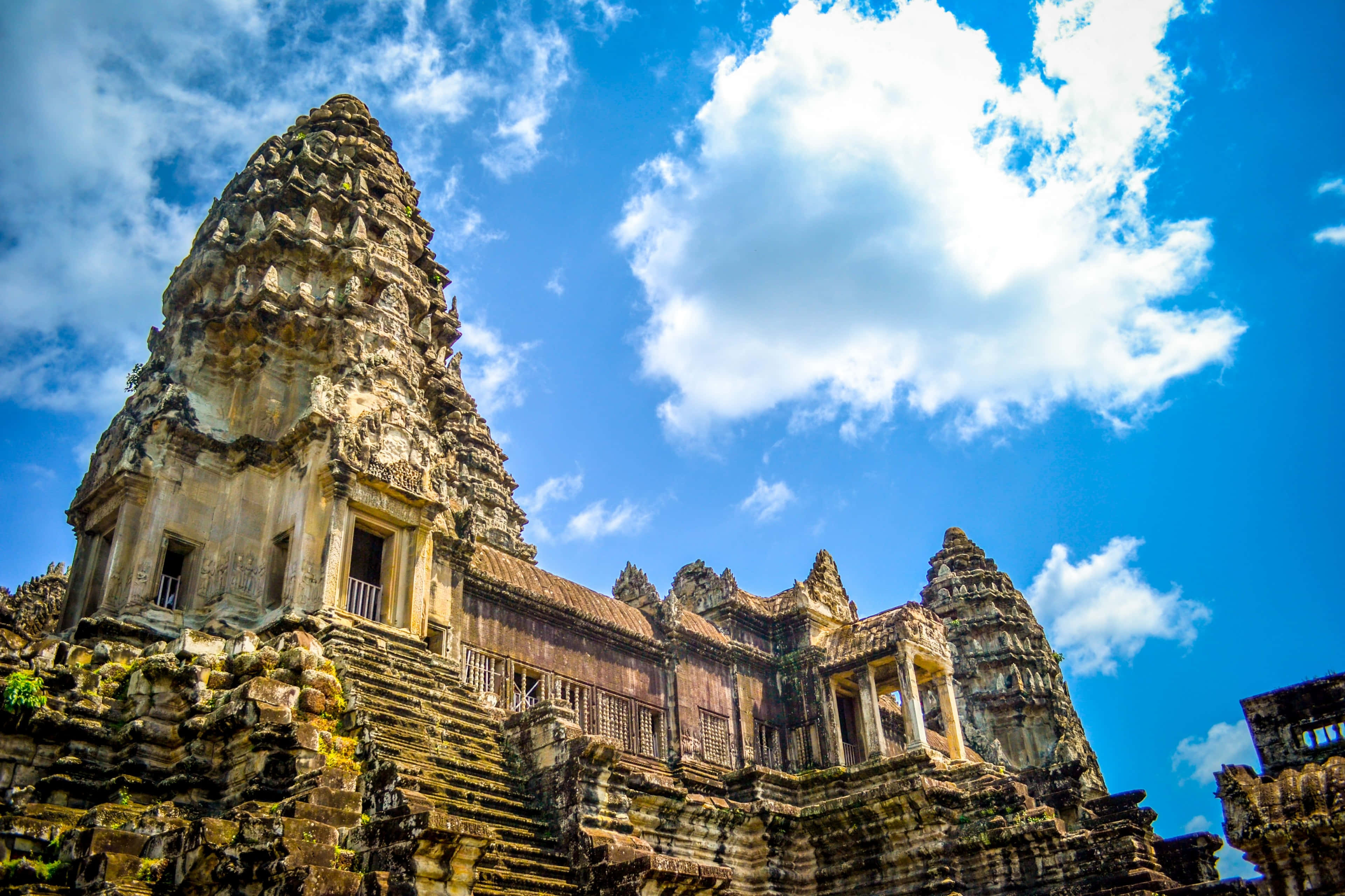 Angkor Thom, blue sky, ancient stone temple towers, 4K Desktop Wallpaper