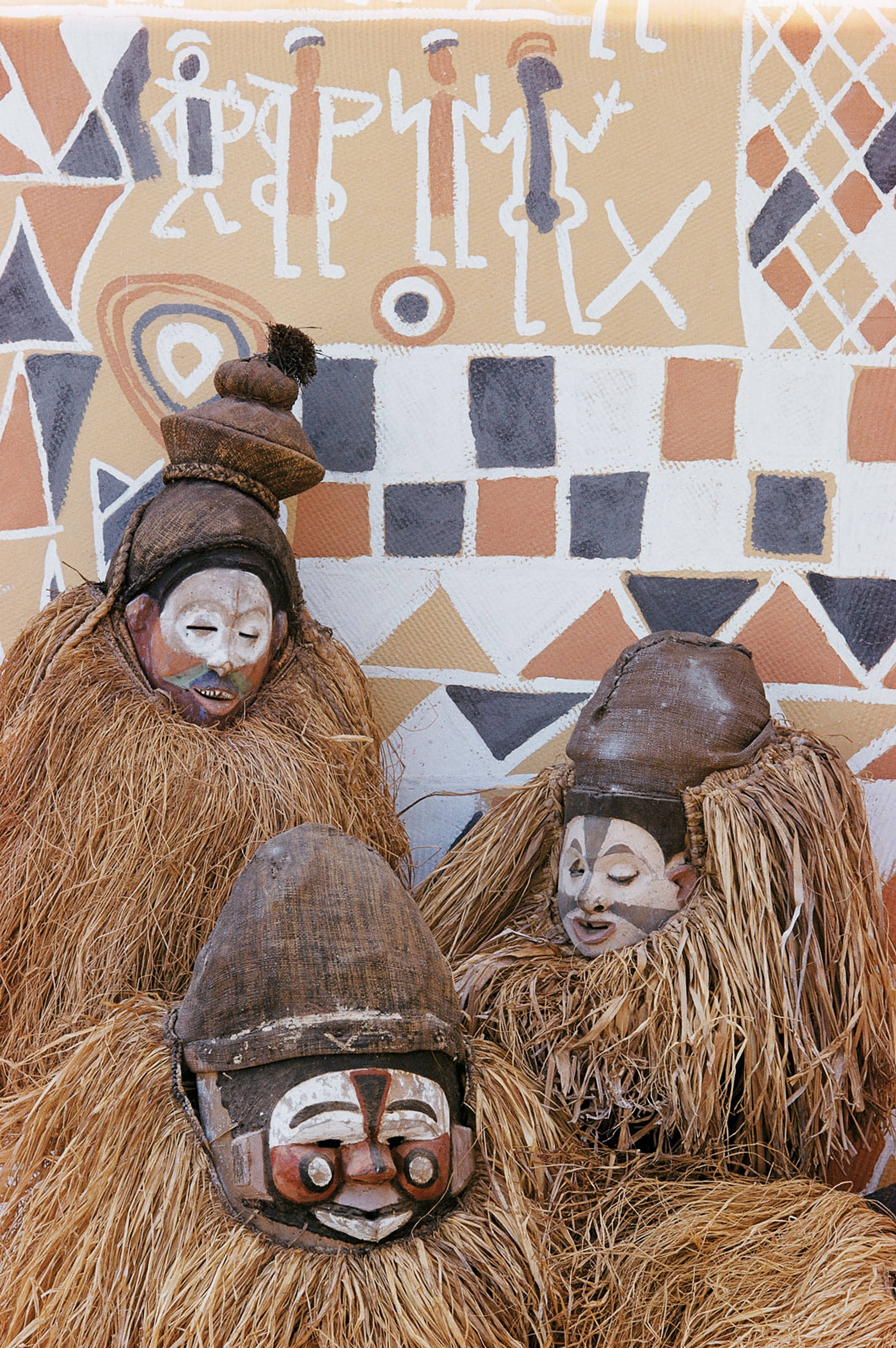 Angola, hay sculptures, grass-draped masks, 2K Phone Wallpaper